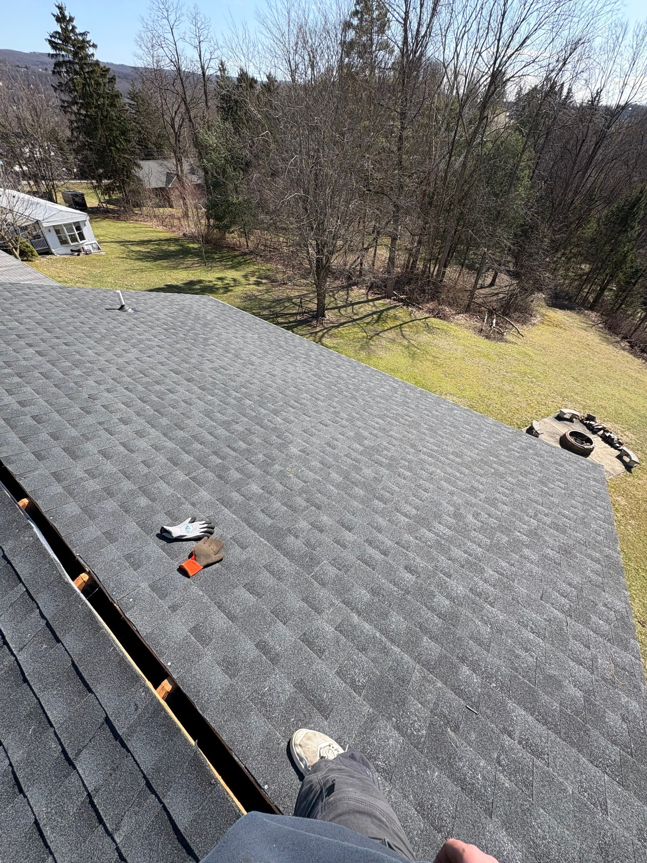 Residential Roofing Installation using GAF Timberline HDZ Charcoal by Rainstoppers Roofing