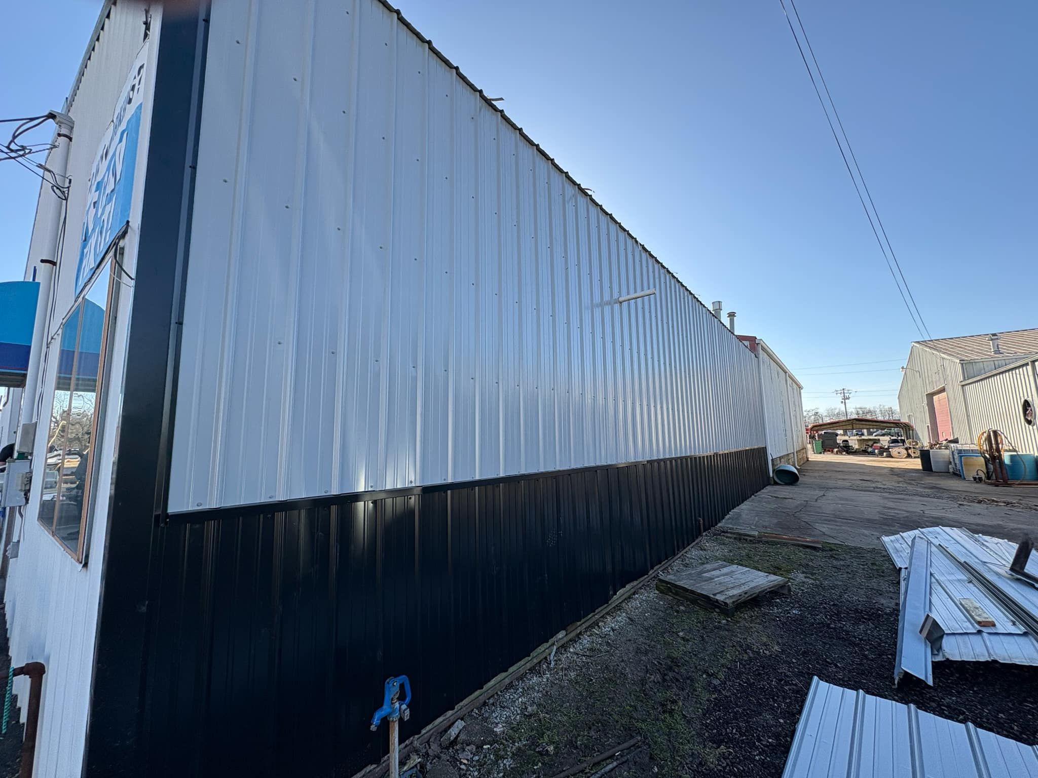 Siding Installation using Metal Siding by Leach and Brown Construction LLC