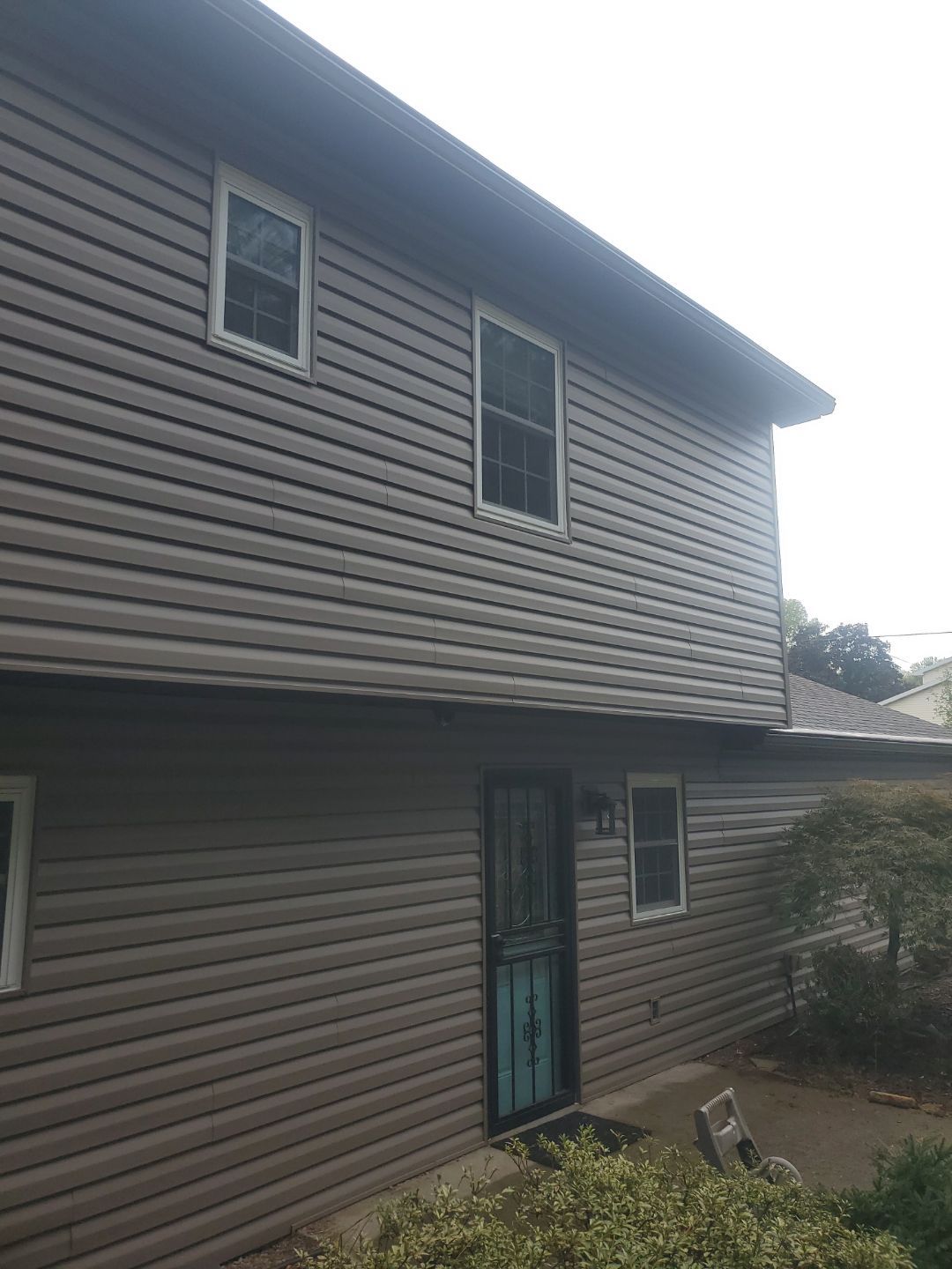 Siding Installation using Vinyl Siding by Rainstoppers Roofing
