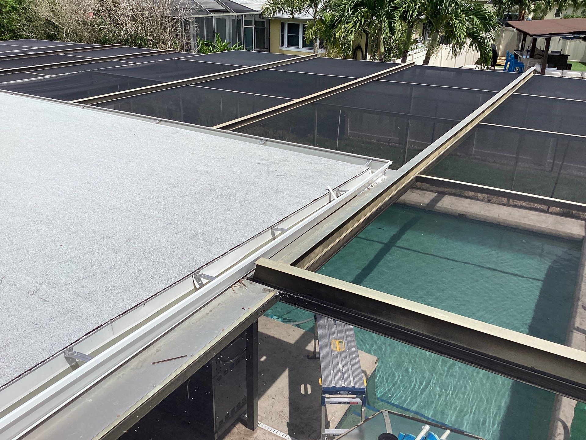 White Seamless Gutters and Splash Guards in Fort Myers FL by Gutter Professor by Gutter Professors