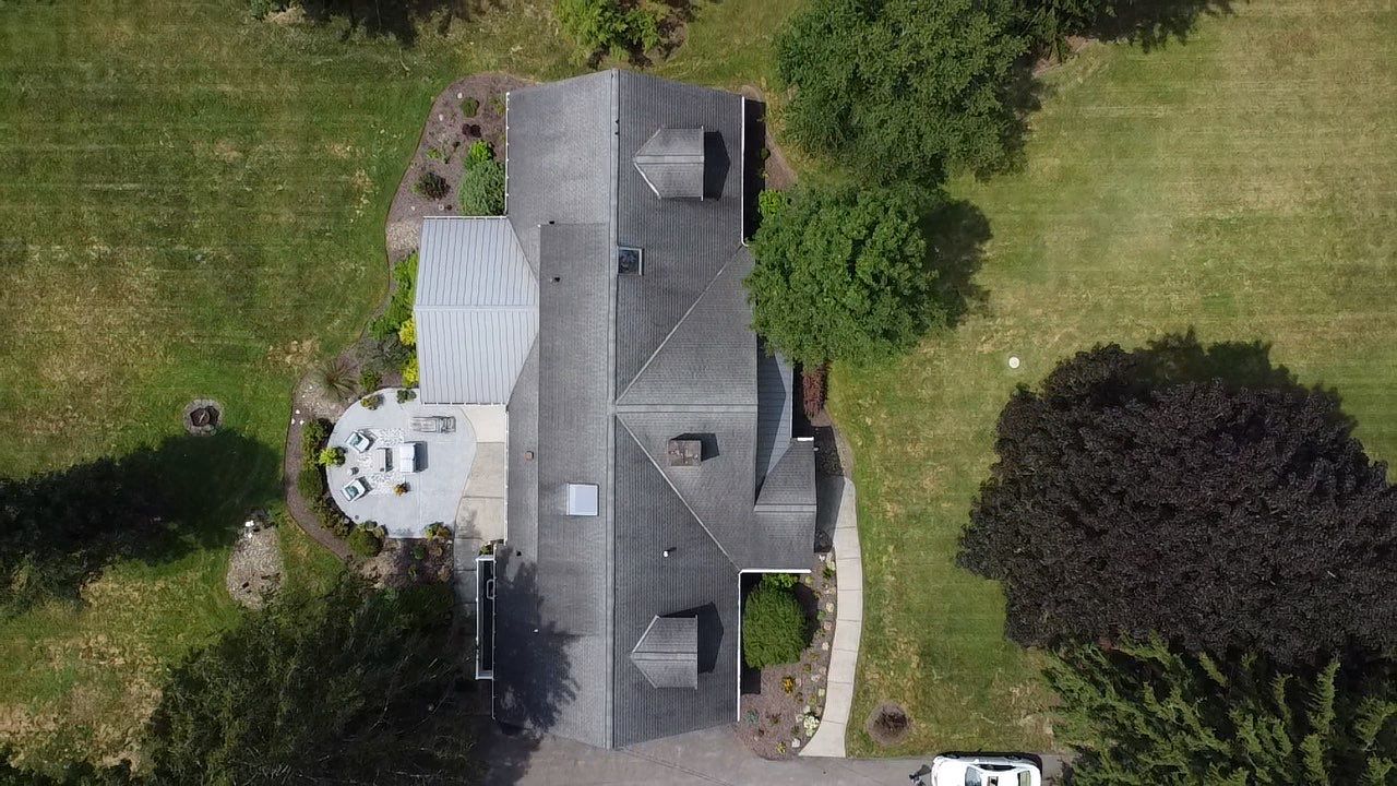 Moreland Hills Roof + Gutters Replacement by Atlas Roofing & Restoration