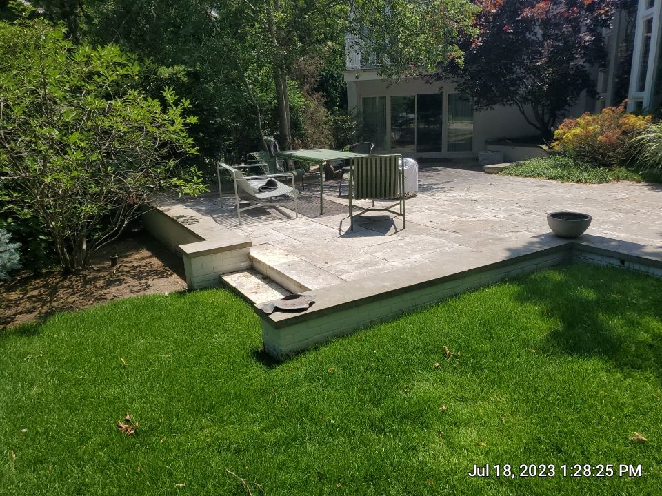 marble patio cleaning and sanding using Polysweep polymeric sand by Northern Power Washing LLC.