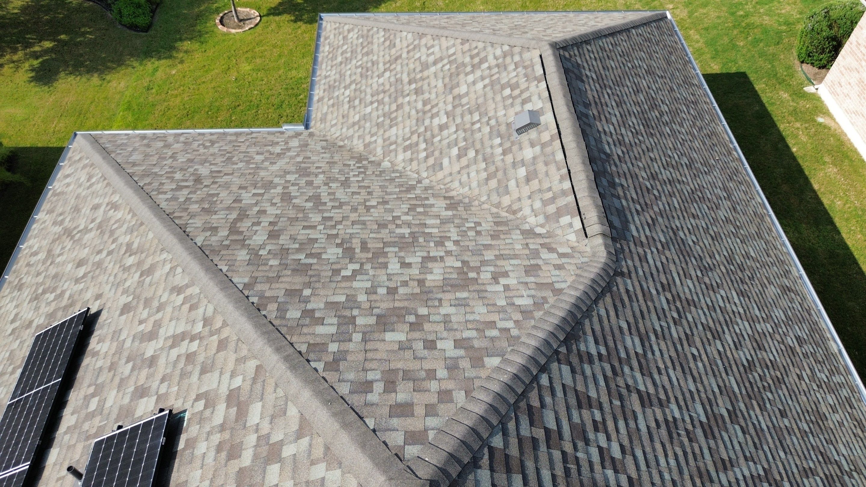 Full Roof Replacement with Solar Reinstall – Duration Driftwood | Round Rock, TX by Kstylez Roofing & Construction