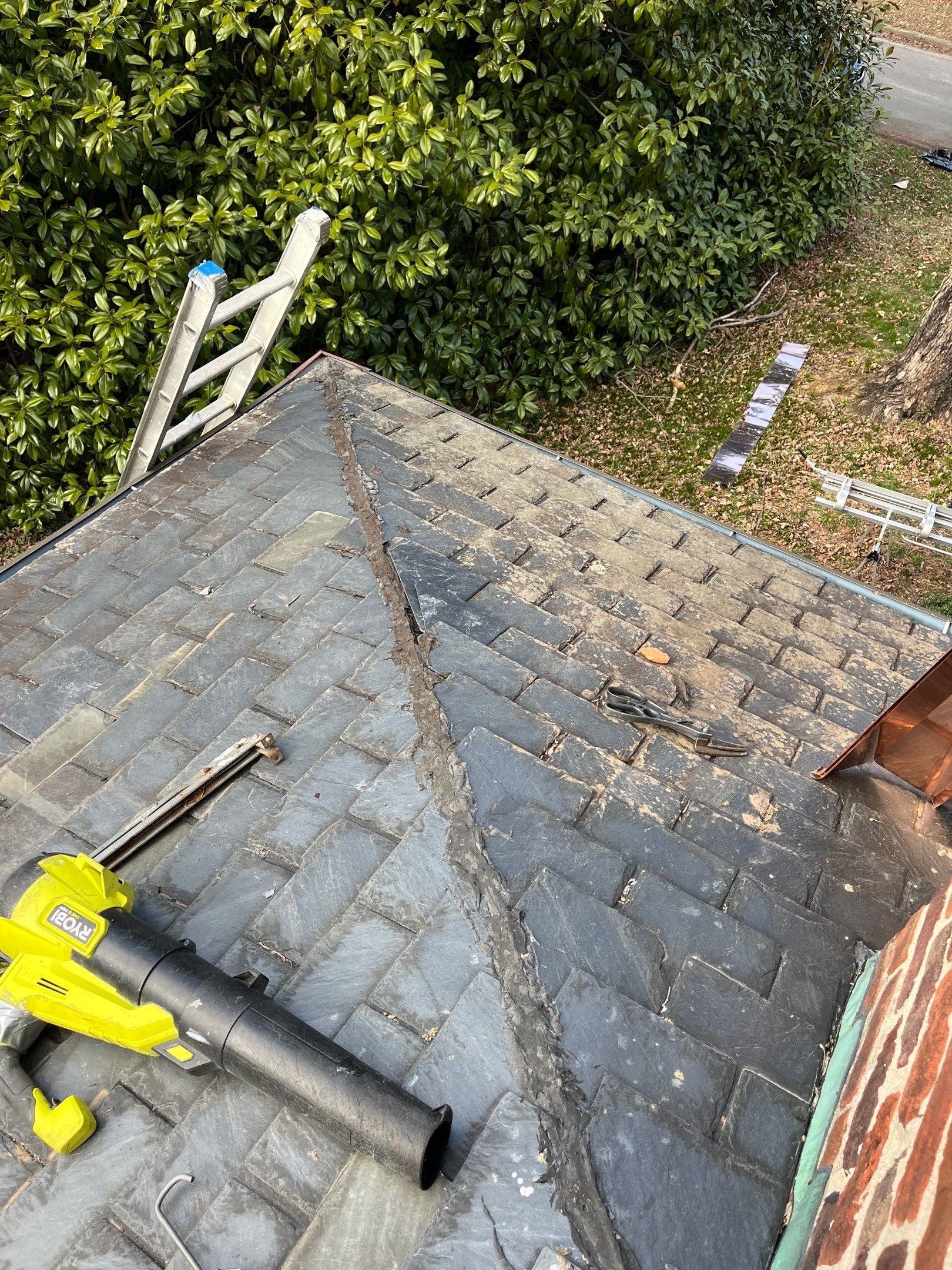 Slate Roof Restoration and Copper Ridge Cap Install in Richmond by Cade Construction