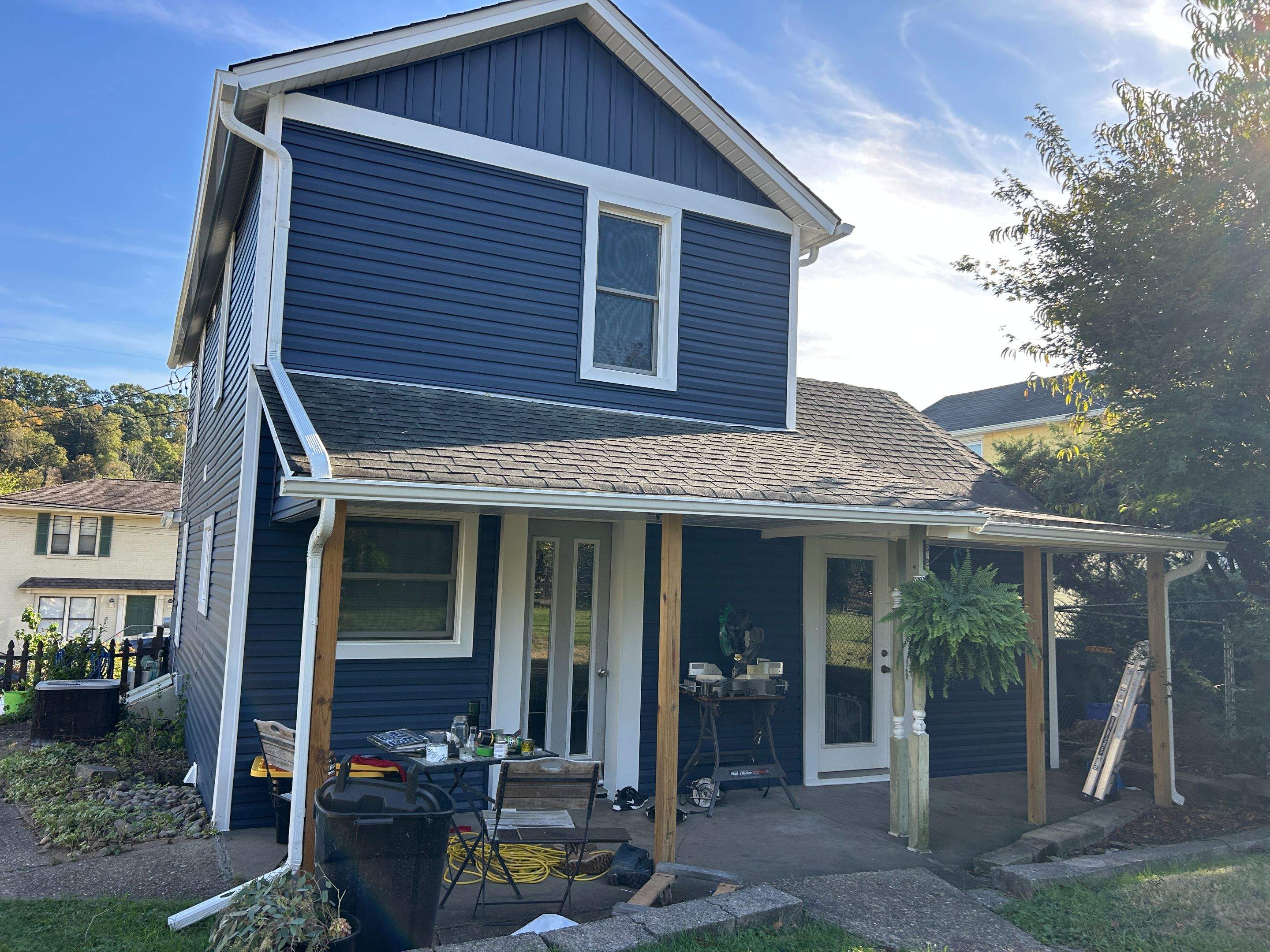 House Siding Renovation with White Vinyl in Bridgeville by Ideal Siding Pittsburgh