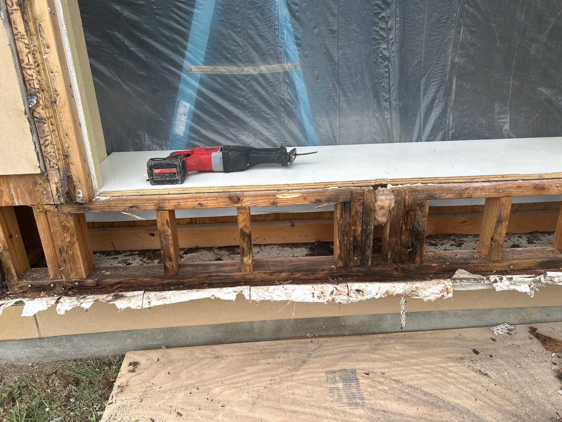 Installing Windows on a Submarine  by Bayfront Roofing and Construction