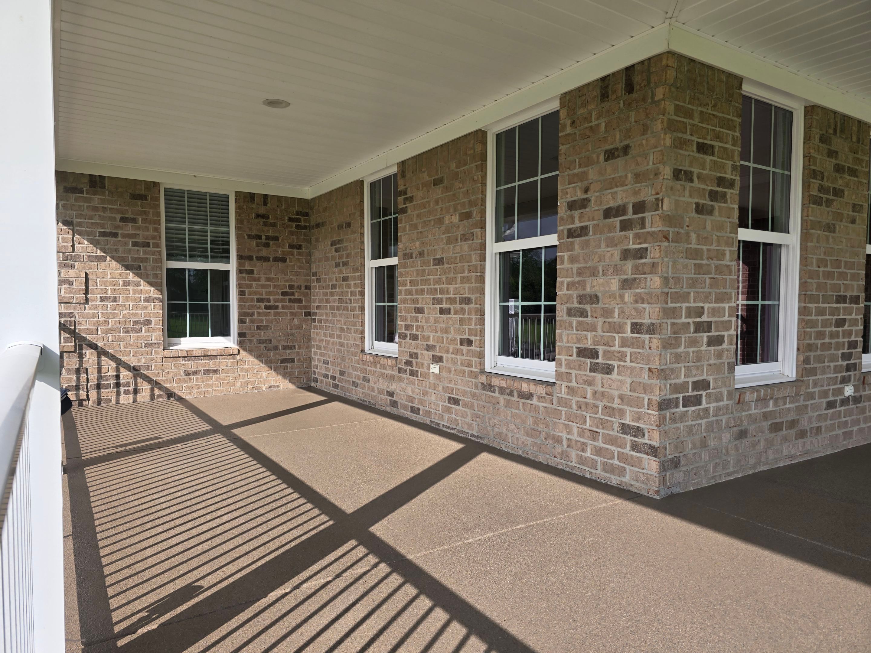Porch & Garage Using Obsidian by Elite Floor Solutions