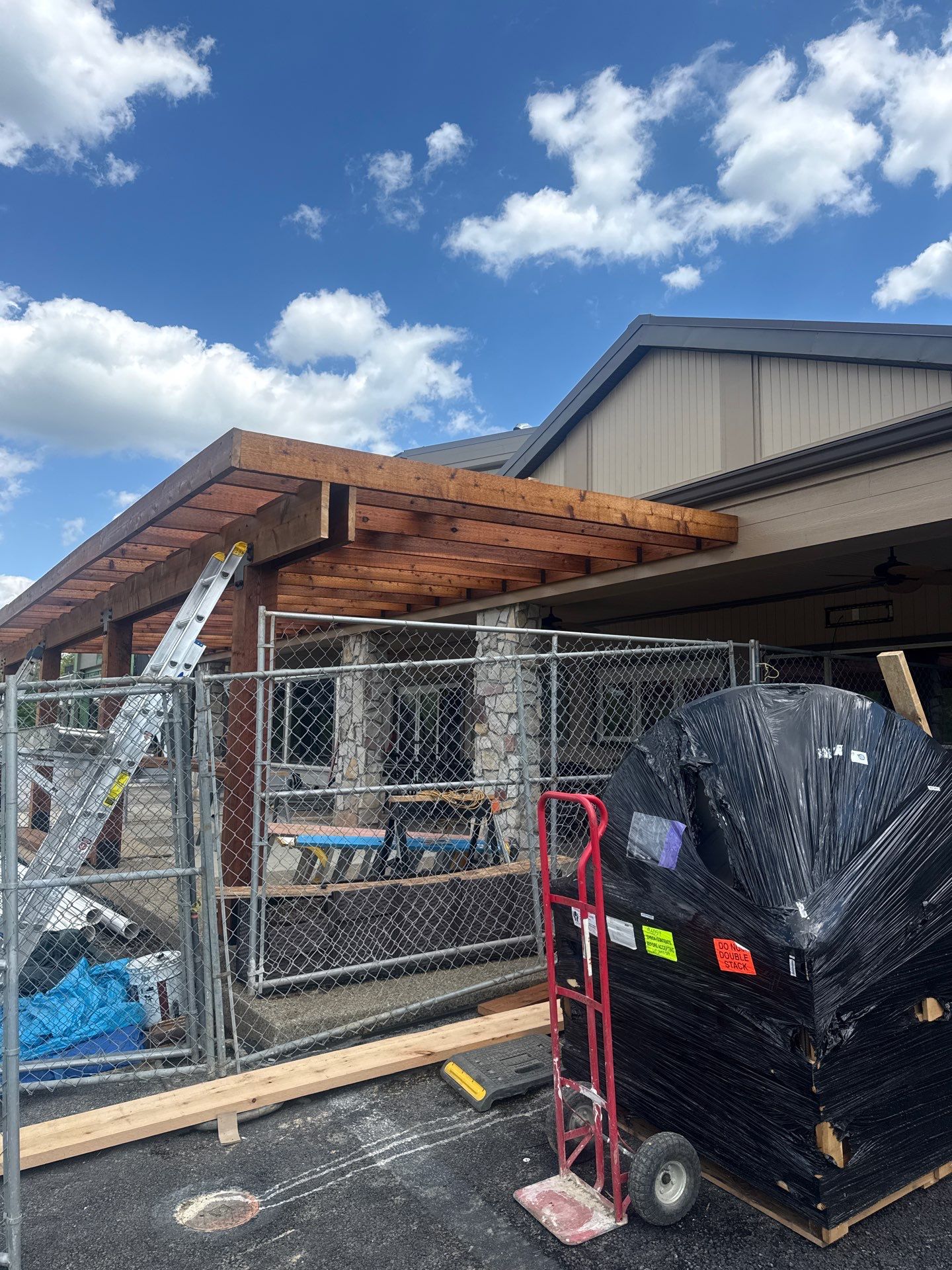 Custom Timber Pergola and Polycarbonate Roof Installation in Canonsburg by Cousins Roofing Siding & Decks