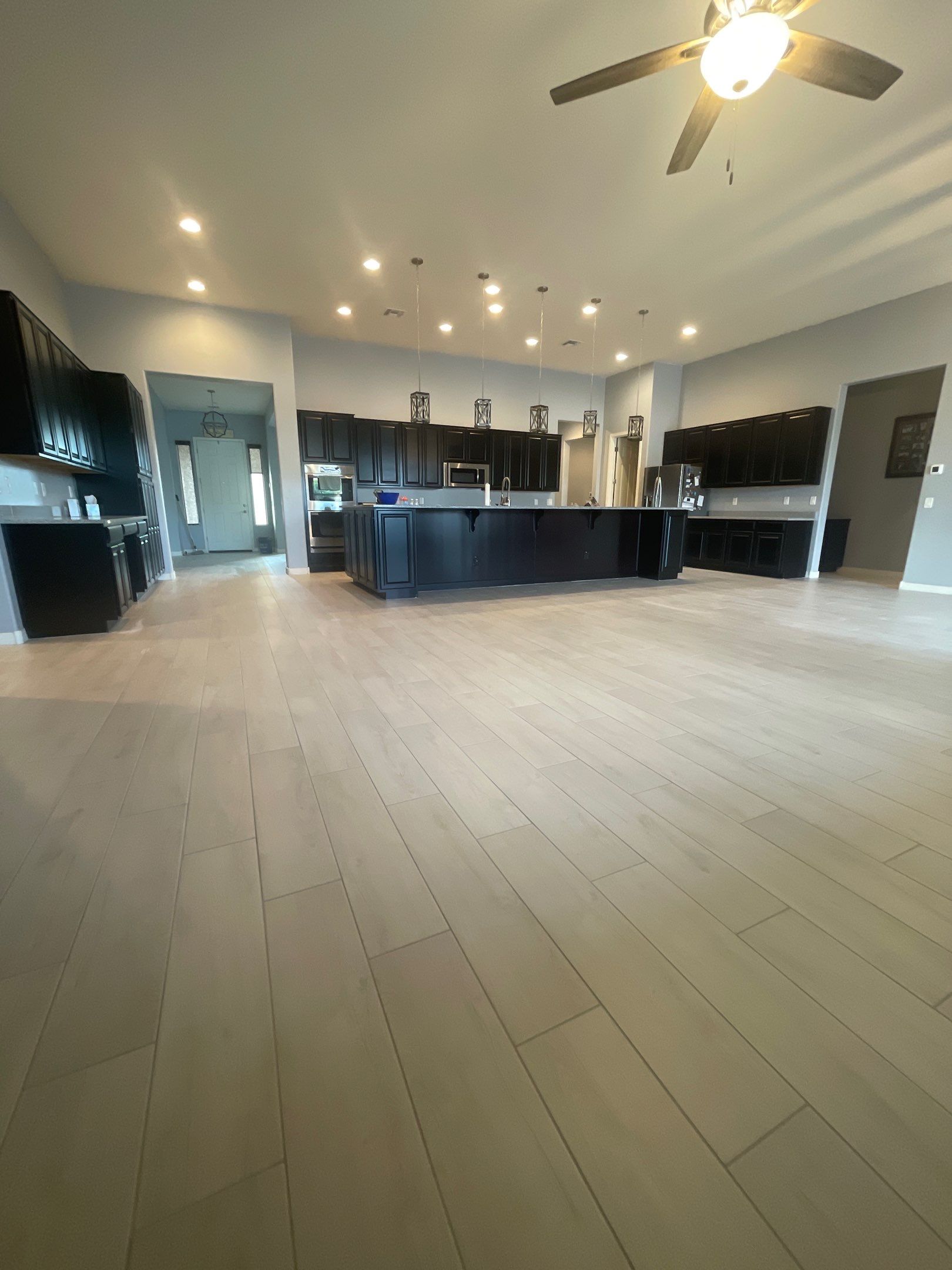 Wood Look Tile Floors and an Extra Large Shower  by Footprints Floors of Chandler 