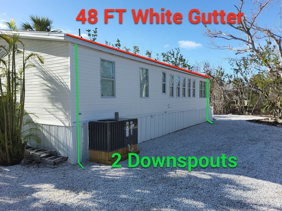 Downspout Installation using Charcoal Grey in Sanibel FL by Gutter Professors