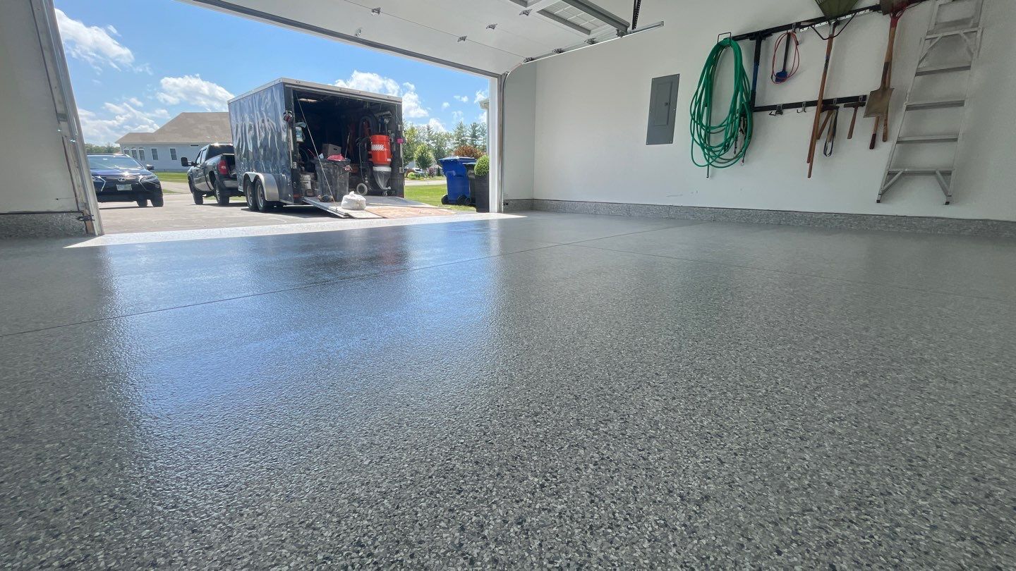 Garage in Londonderry, NH 03053 by Symphony Concrete Coatings