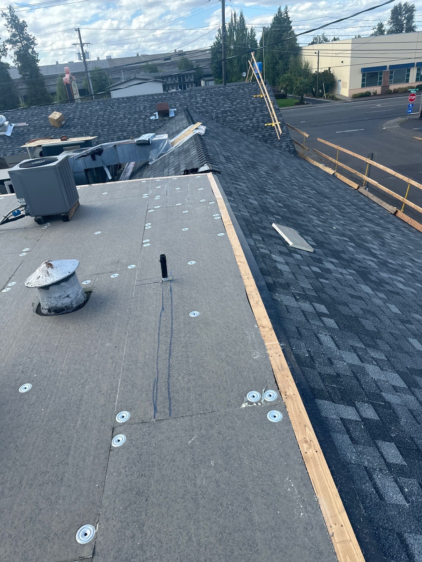 Summit Grey Lum Yun Salem Oregon Commercial Roof by Orezona Building & Roofing Company, Inc.