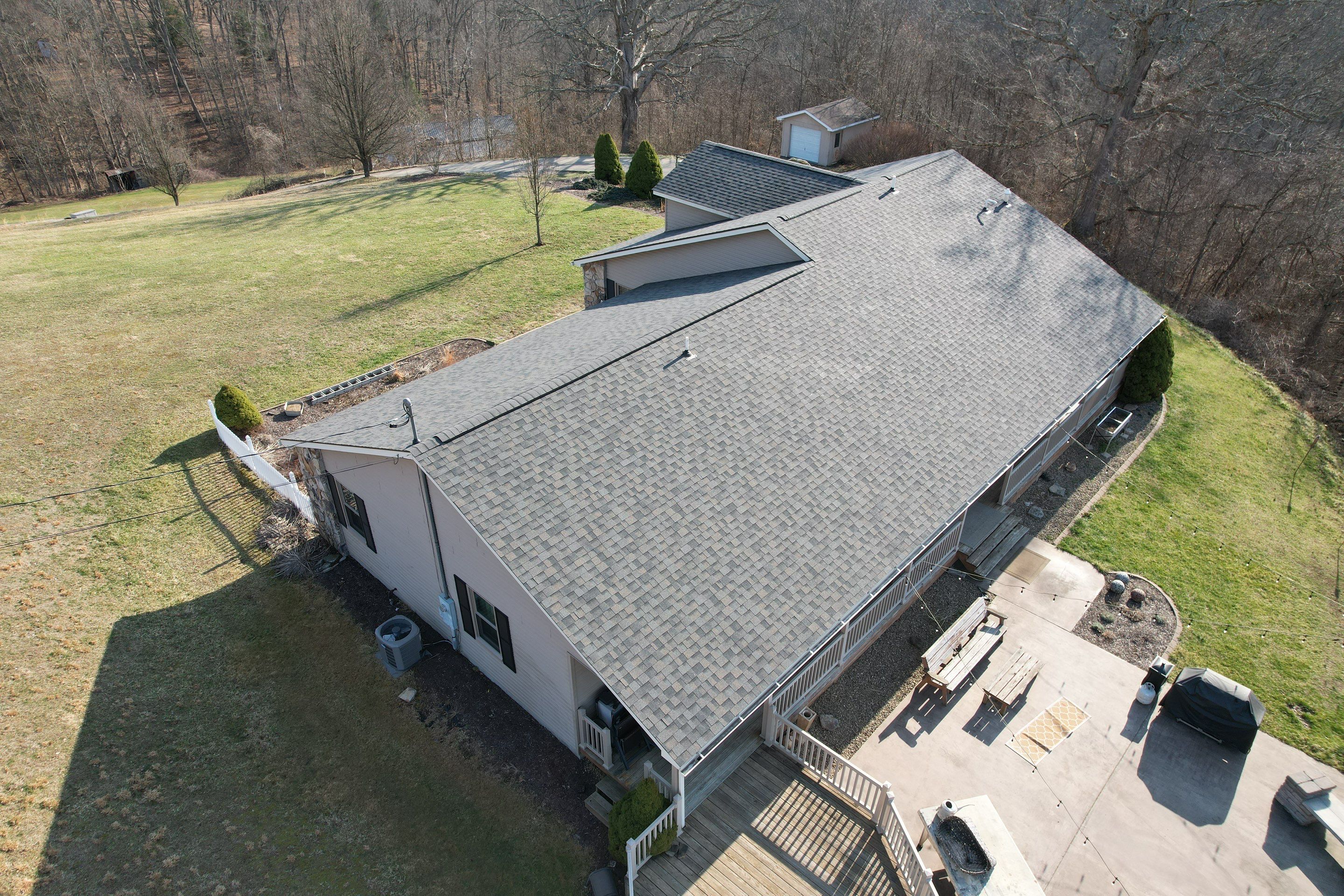 Residential Roofing Installation using GAF Timberline HDZ Charcoal by Rainstoppers Roofing
