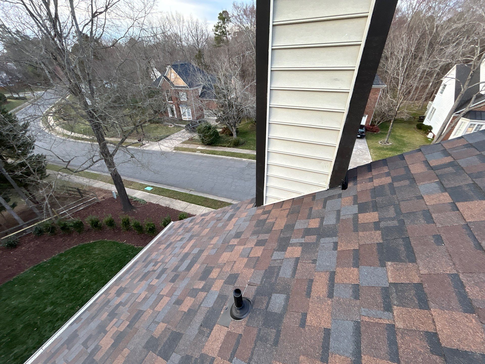Owens Corning Duration Shingle Roof Replacement and Velux Skylight Installation in Charlotte by Merritt Roofing LLC
