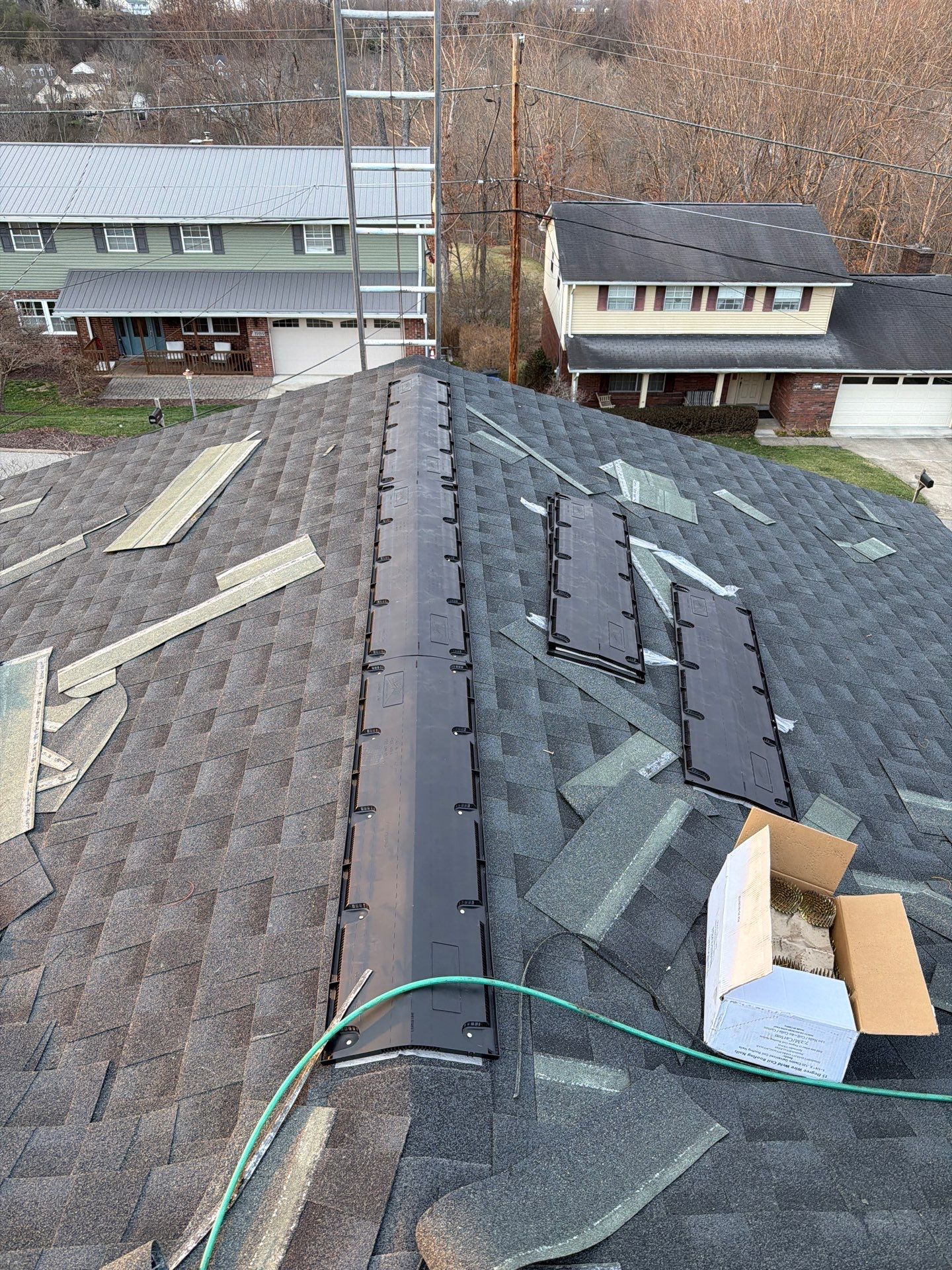 Residential Roofing Installation using GAF Timberline HDZ Charcoal by Rainstoppers Roofing