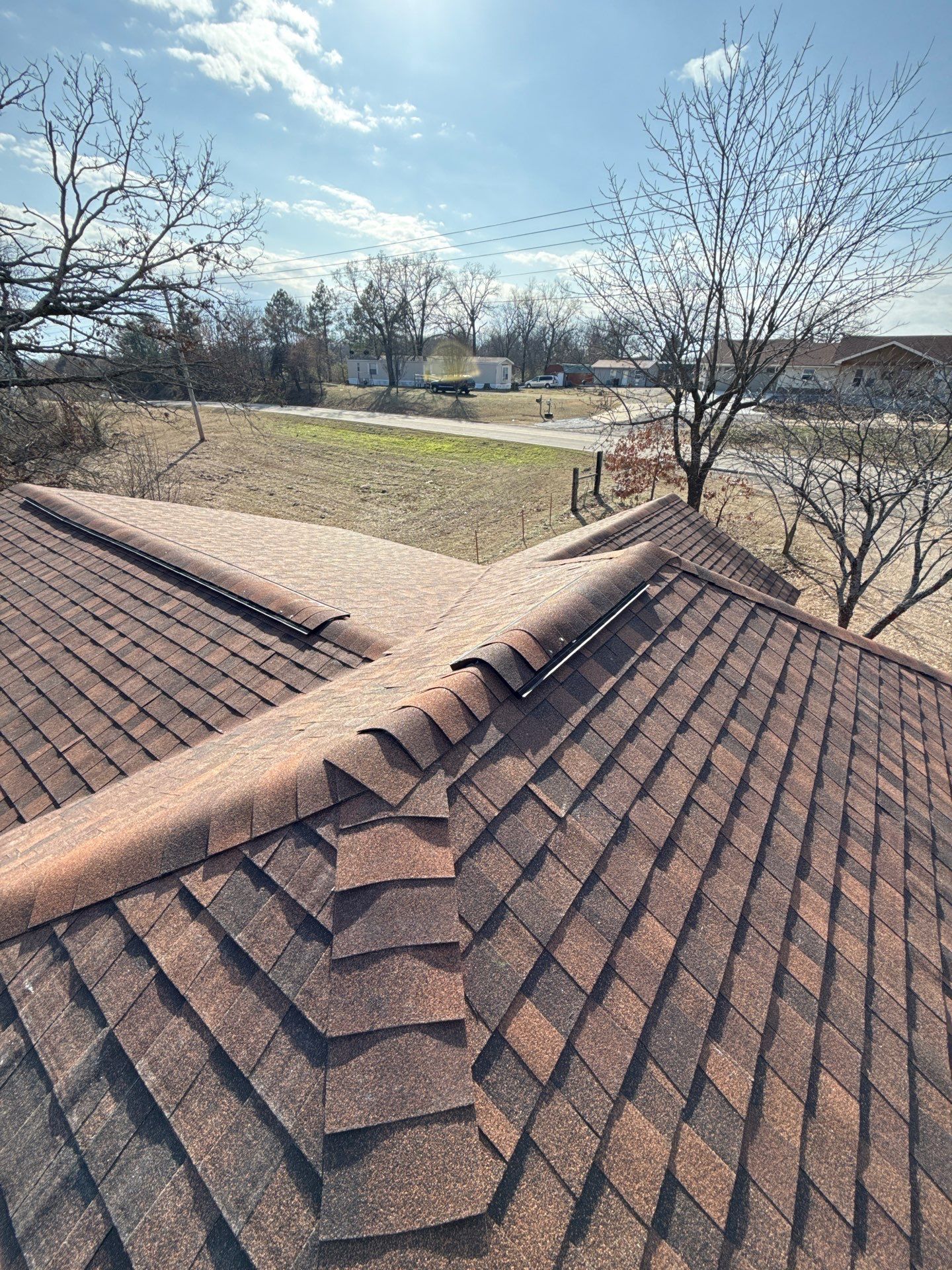 Rustic Hickory Shingles & SBS Cap & Base by In & Out Construction & Remodeling, LLC
