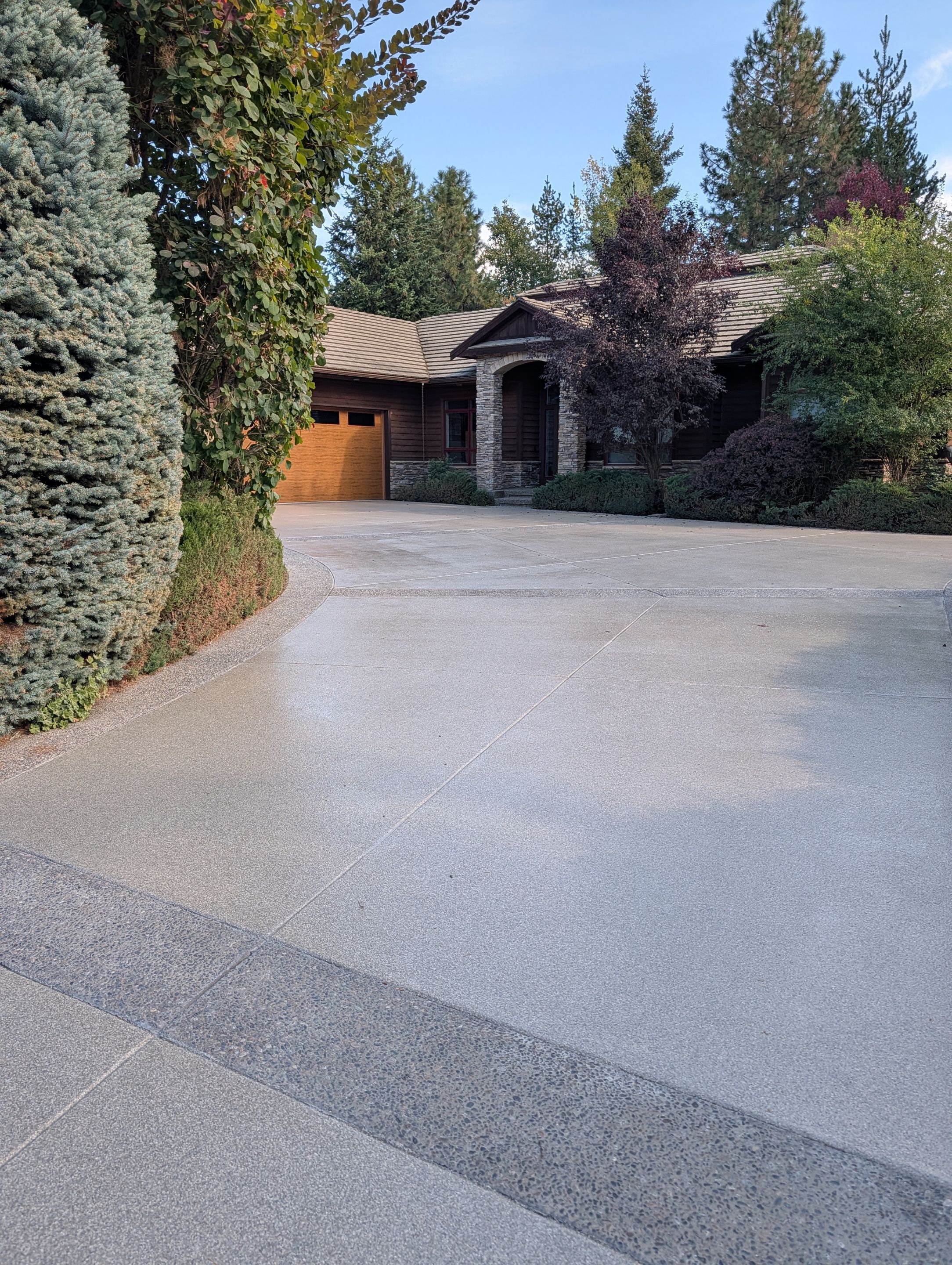 Driveway using Penntek Evolution System and Trail Mix 1/8" Chip by Croc Coatings, LLC