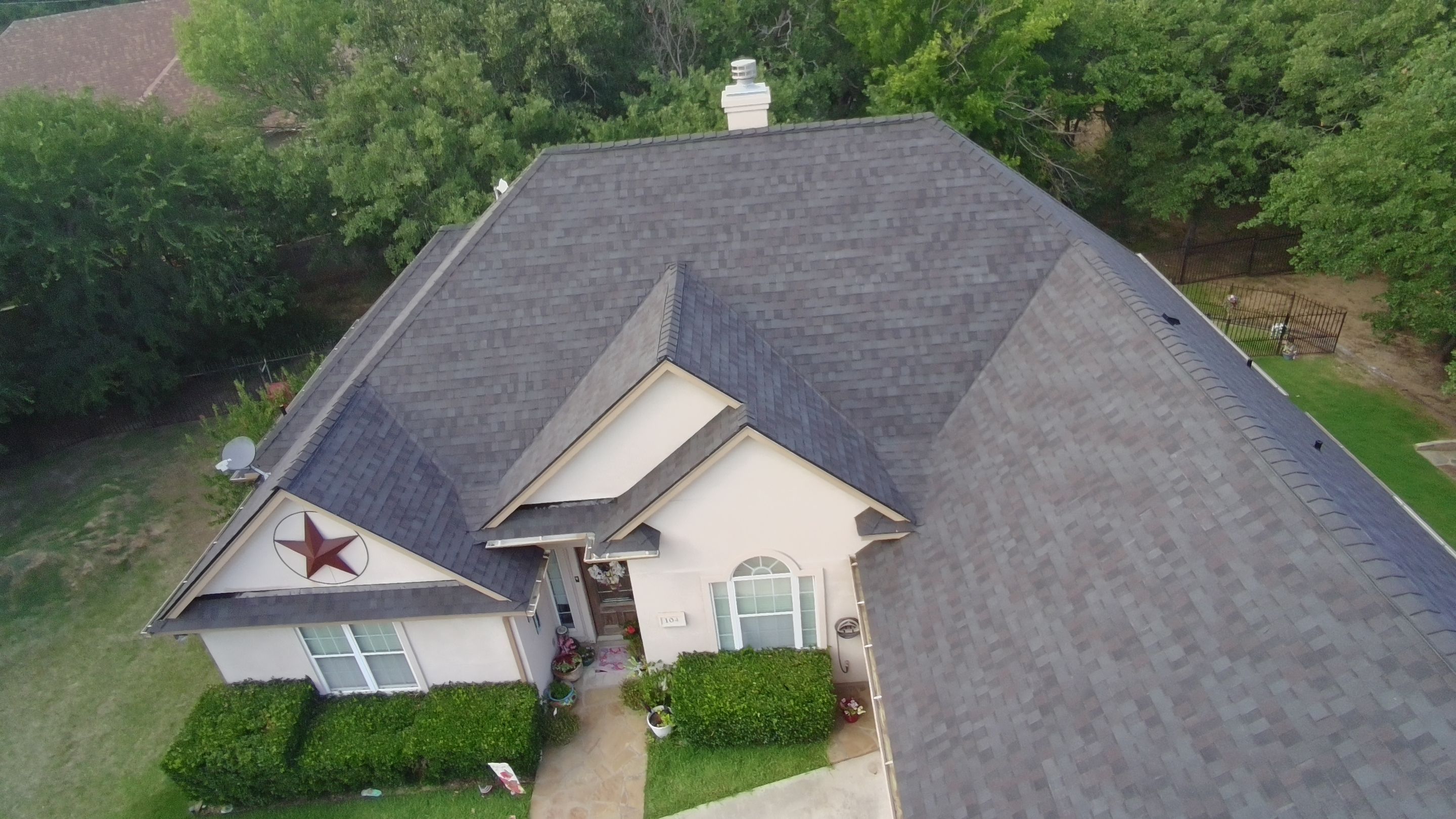 Residential Roof Replacement Using Tamko Titan Shingles in Runaway Bay by Armor Roofing | Exteriors