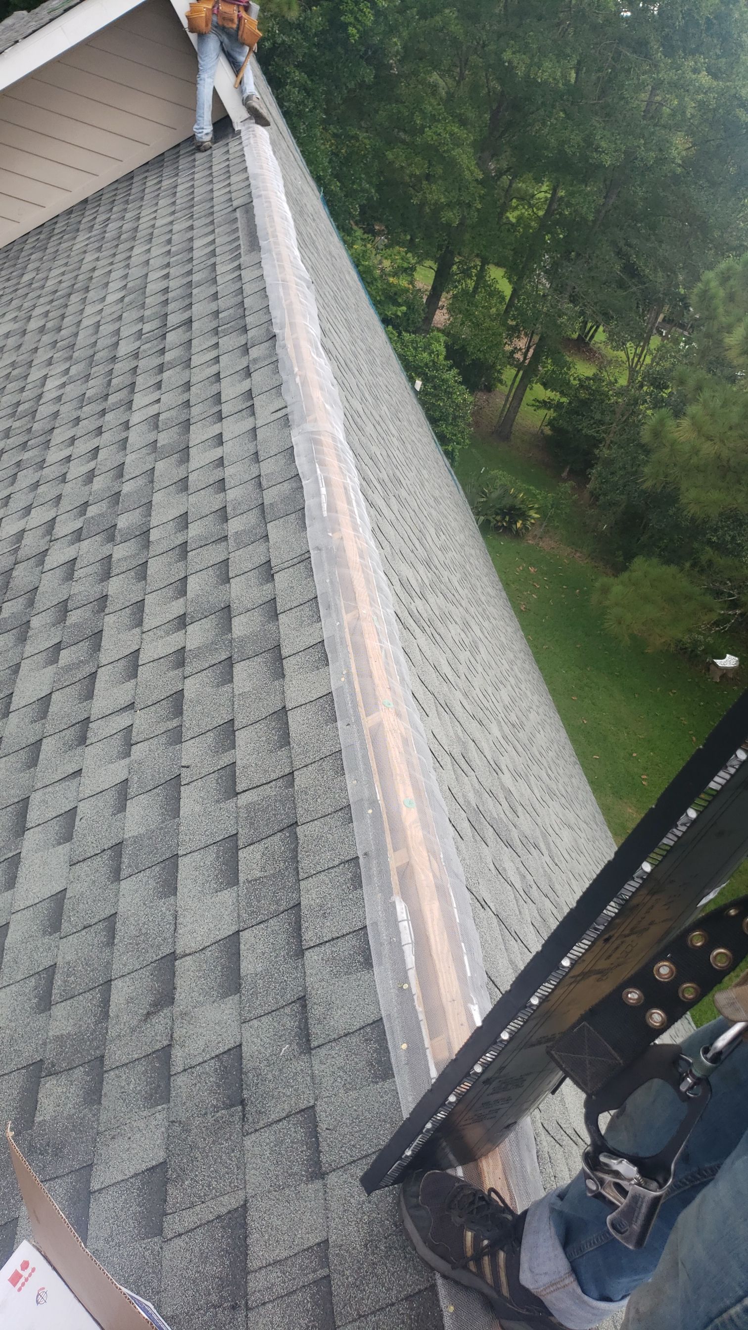 Residential Roofing Installation using Roof Replacement by American Roofing & Construction LLC