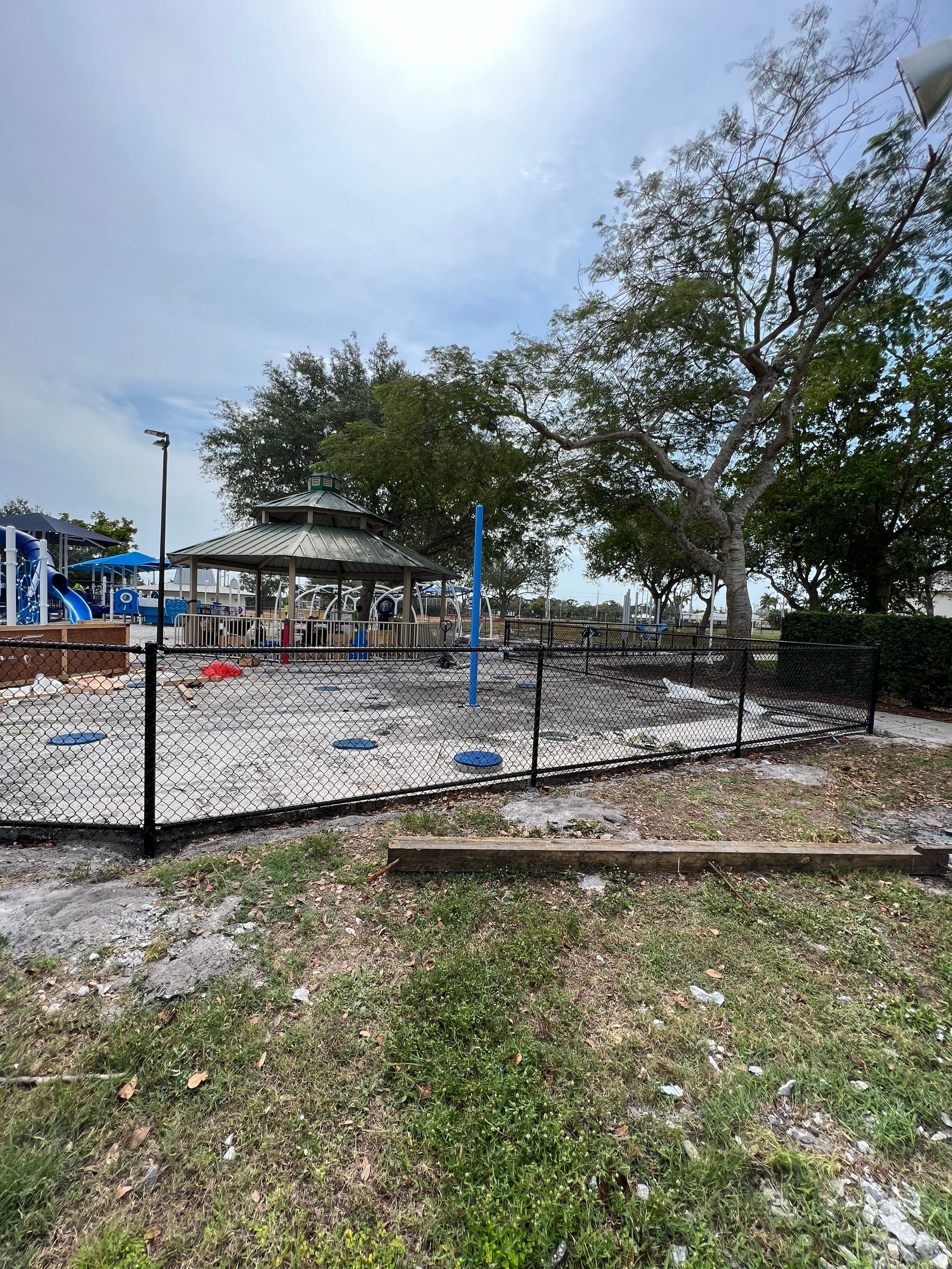 Vinyl Coated Chain-link fence for the City of Naples around Fleischmann Park Playground.  by Asap fence and gates, LLC
