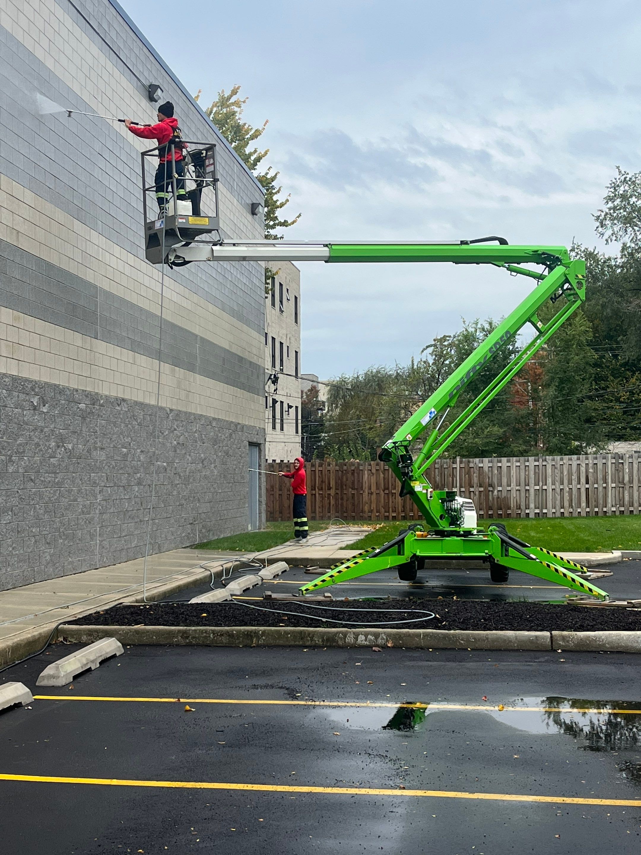 commercial pressure washing using Algaecide, soft wash soap by Northern Power Washing LLC.