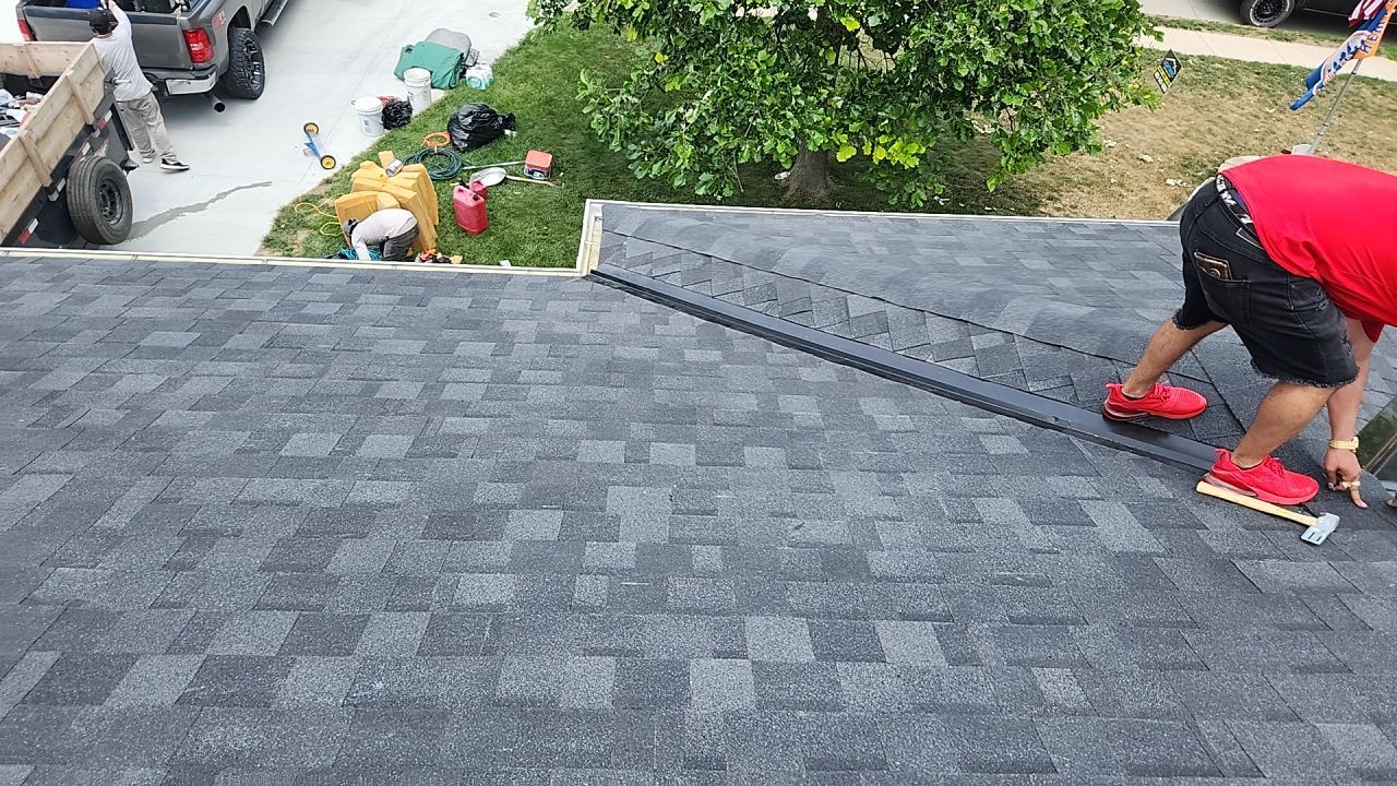 Roofing / Siding / Gutters using IKO Dynasty Granite Black / Norandex Siding by Lightning Exteriors