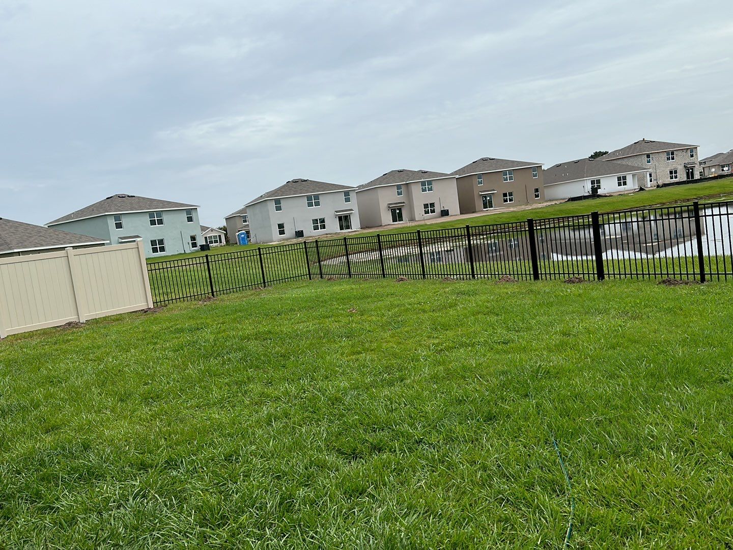 Vinyl Fence Installation using Vinyl and Black 3 Rail Aluminum Fence by Asap fence and gates, LLC
