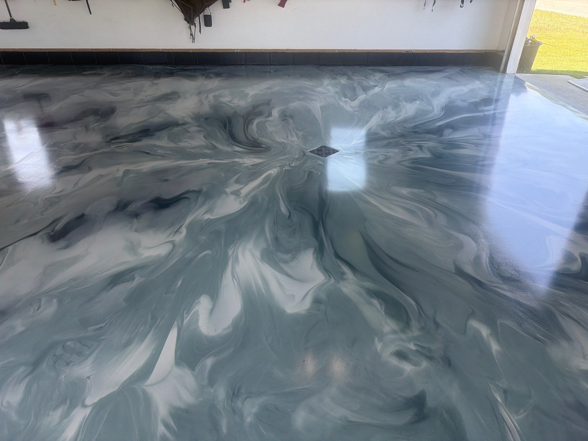 Custom Metallic Epoxy Floor and Polished Countertop Installation in Mears by Gordon Painting