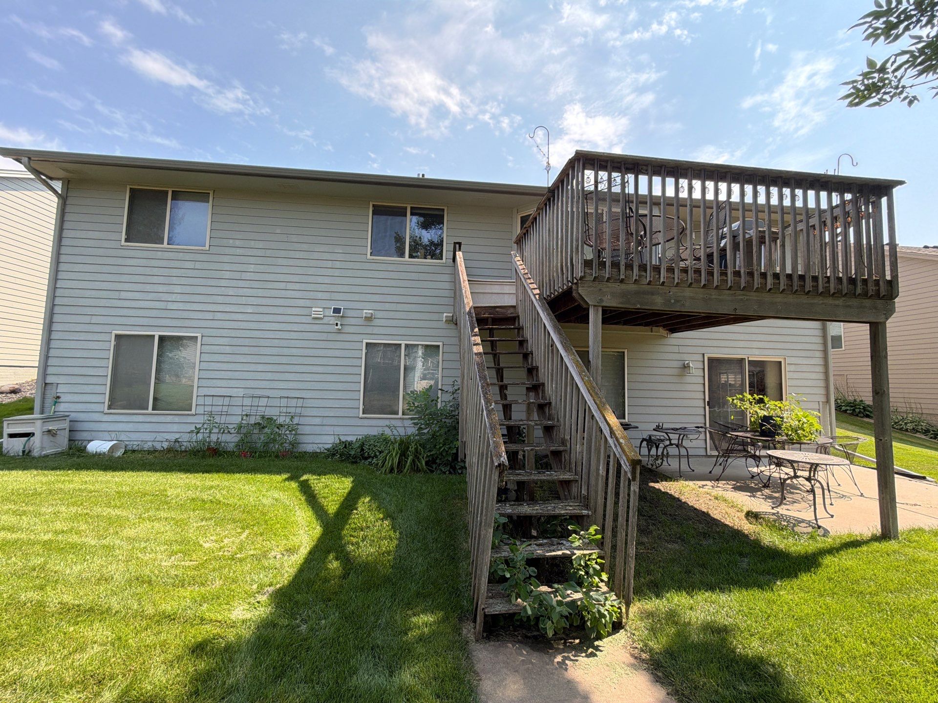 Exterior Painting for Vinyl Siding and Trim in Sioux Falls by Select Painting, Coatings & Garage Cabinets