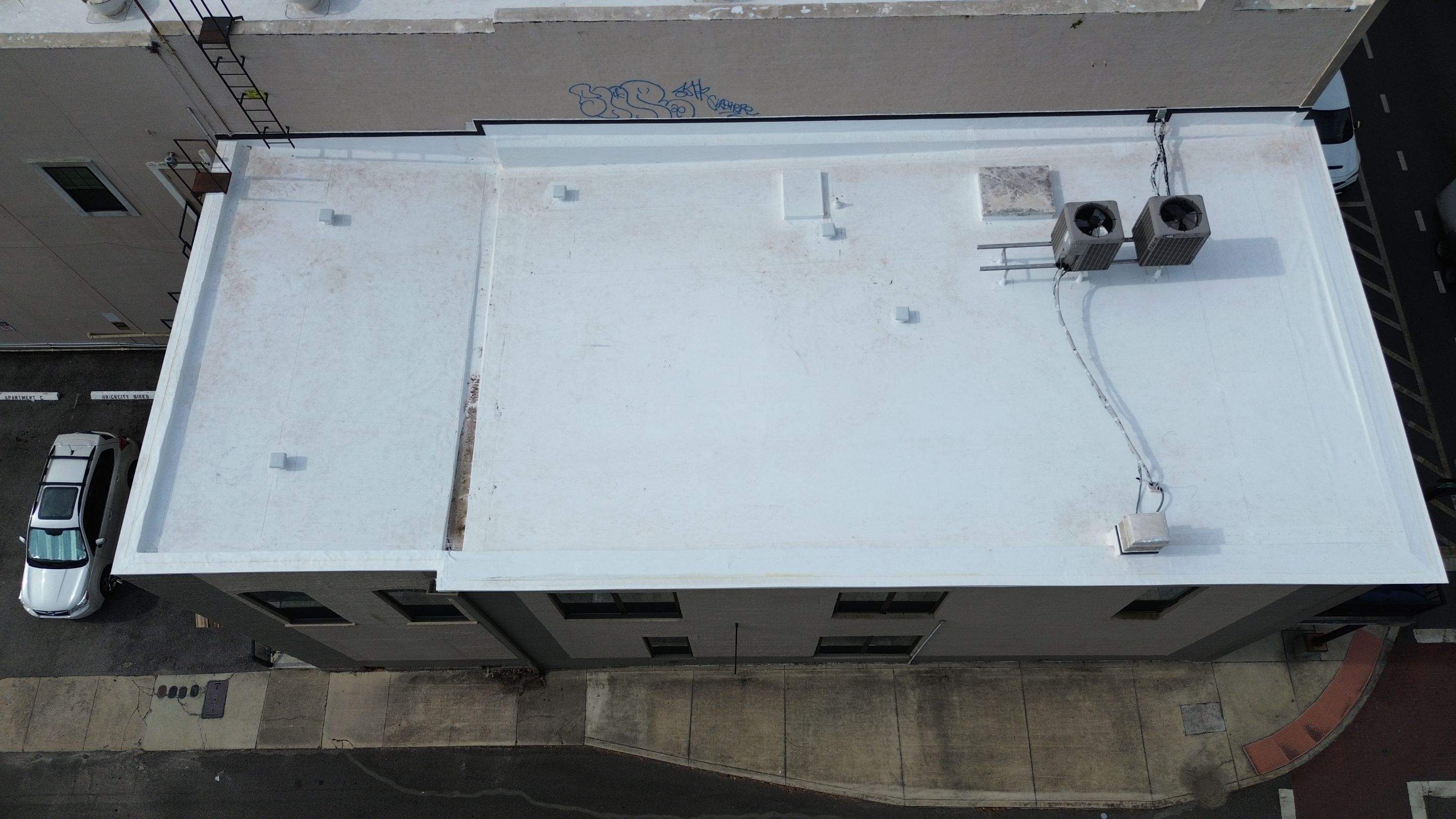 Flat Commercial TPO Reroof in Downtown Ocala, FL by Brehm Roofing