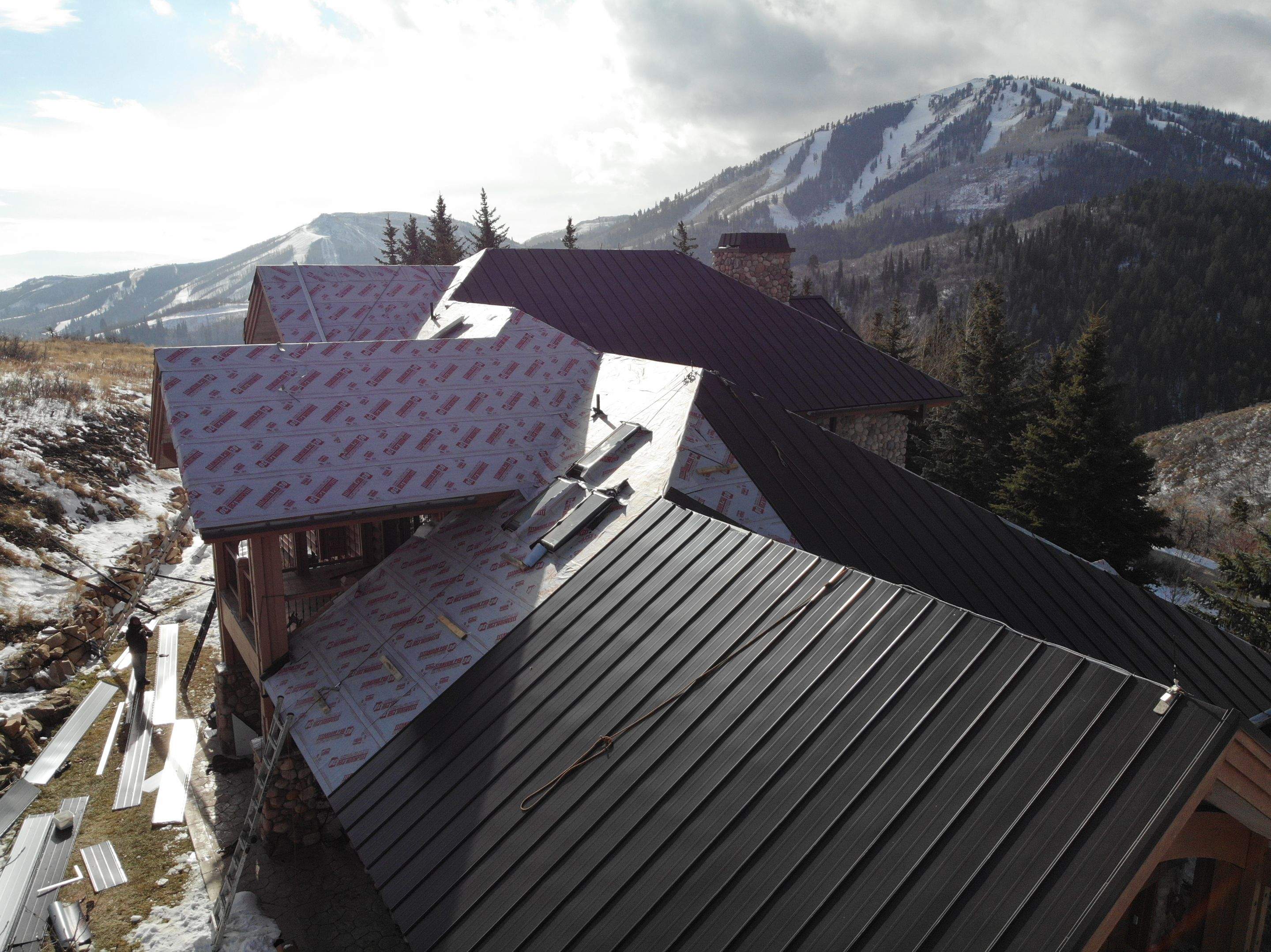 Standing Seam Metal Roof Replacement After Snow Damage by ASAP Roofing & Restoration