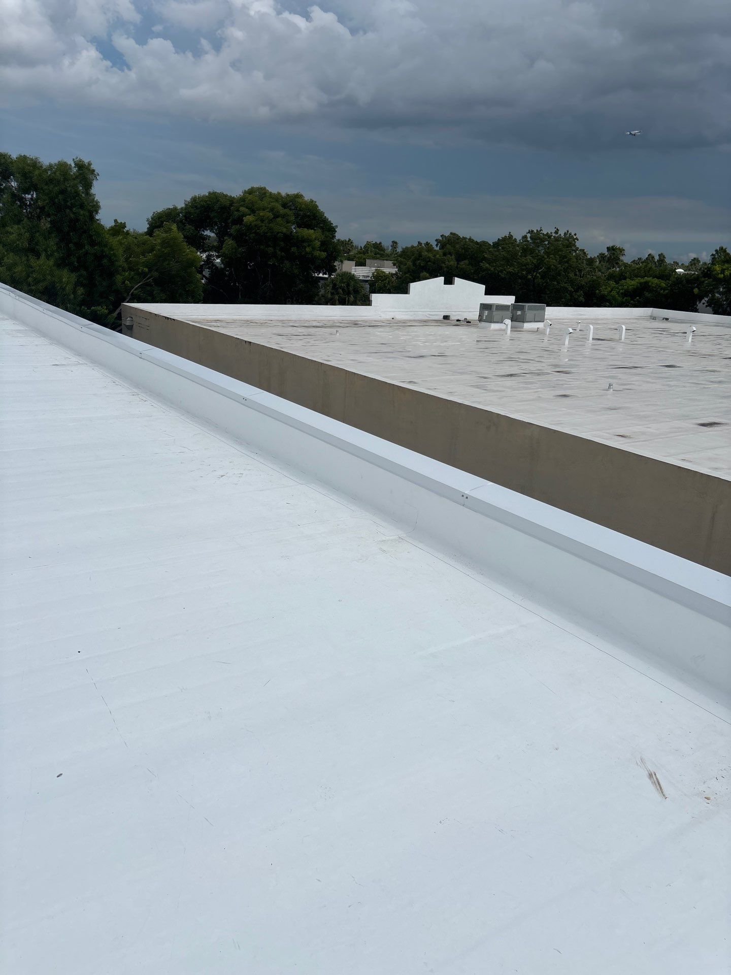 Commercial Flat Roof Replacement for Caribbean Catering in Doral by AJF ROOFING INC