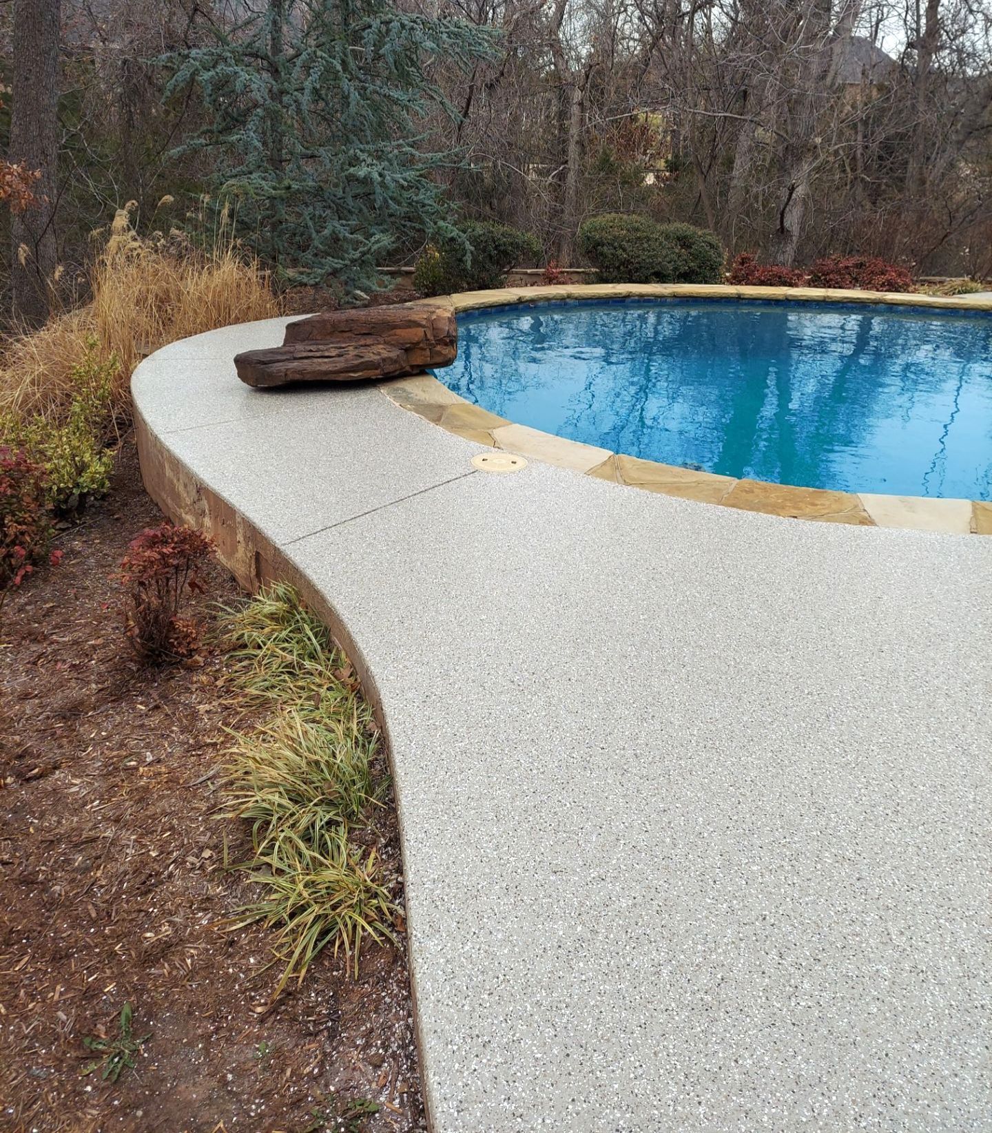 Pool Deck Install with Pebble Beach by Copperhead Coatings