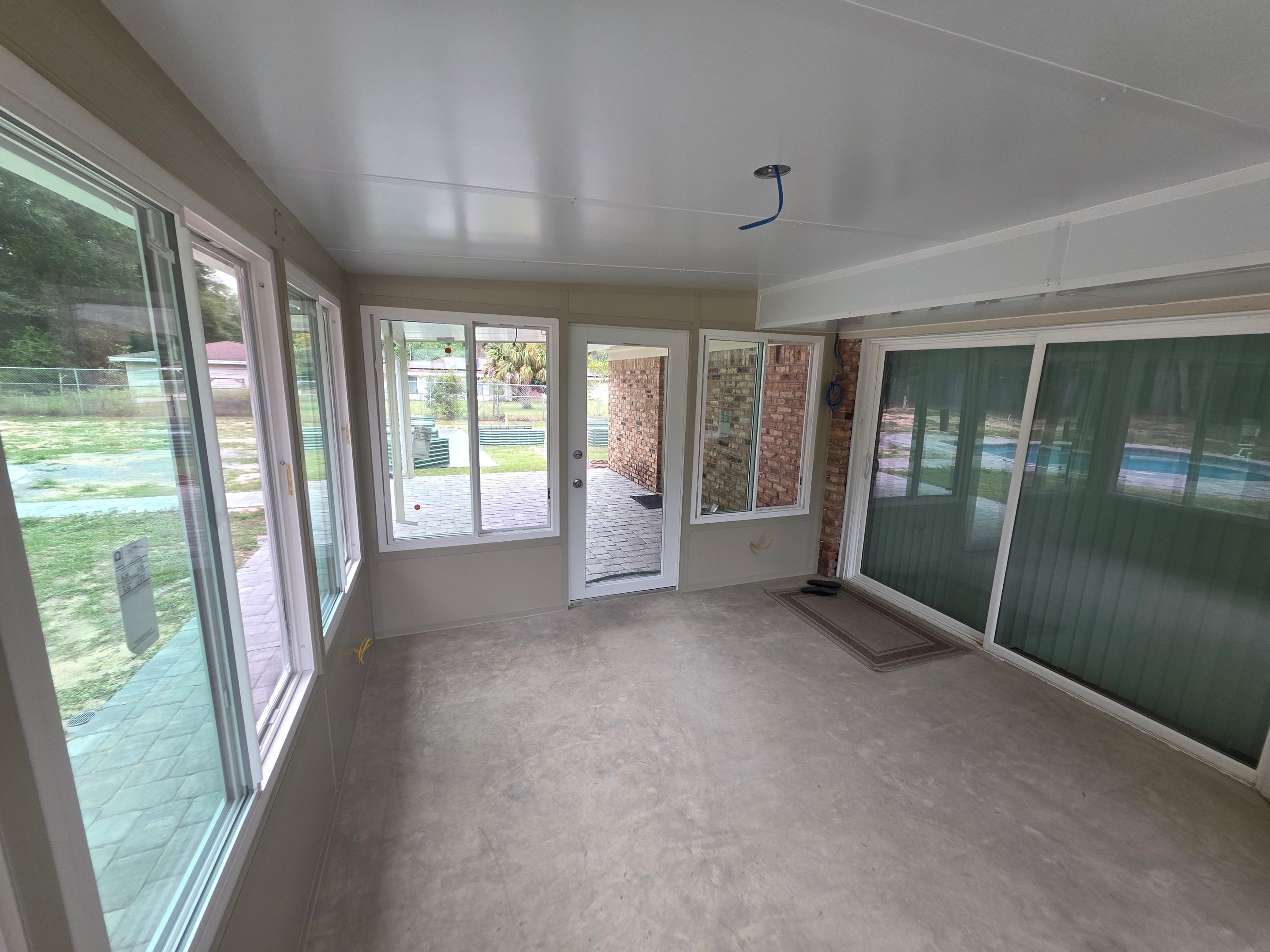 Sunroom Addition and Covered Patio by Titan Sunrooms