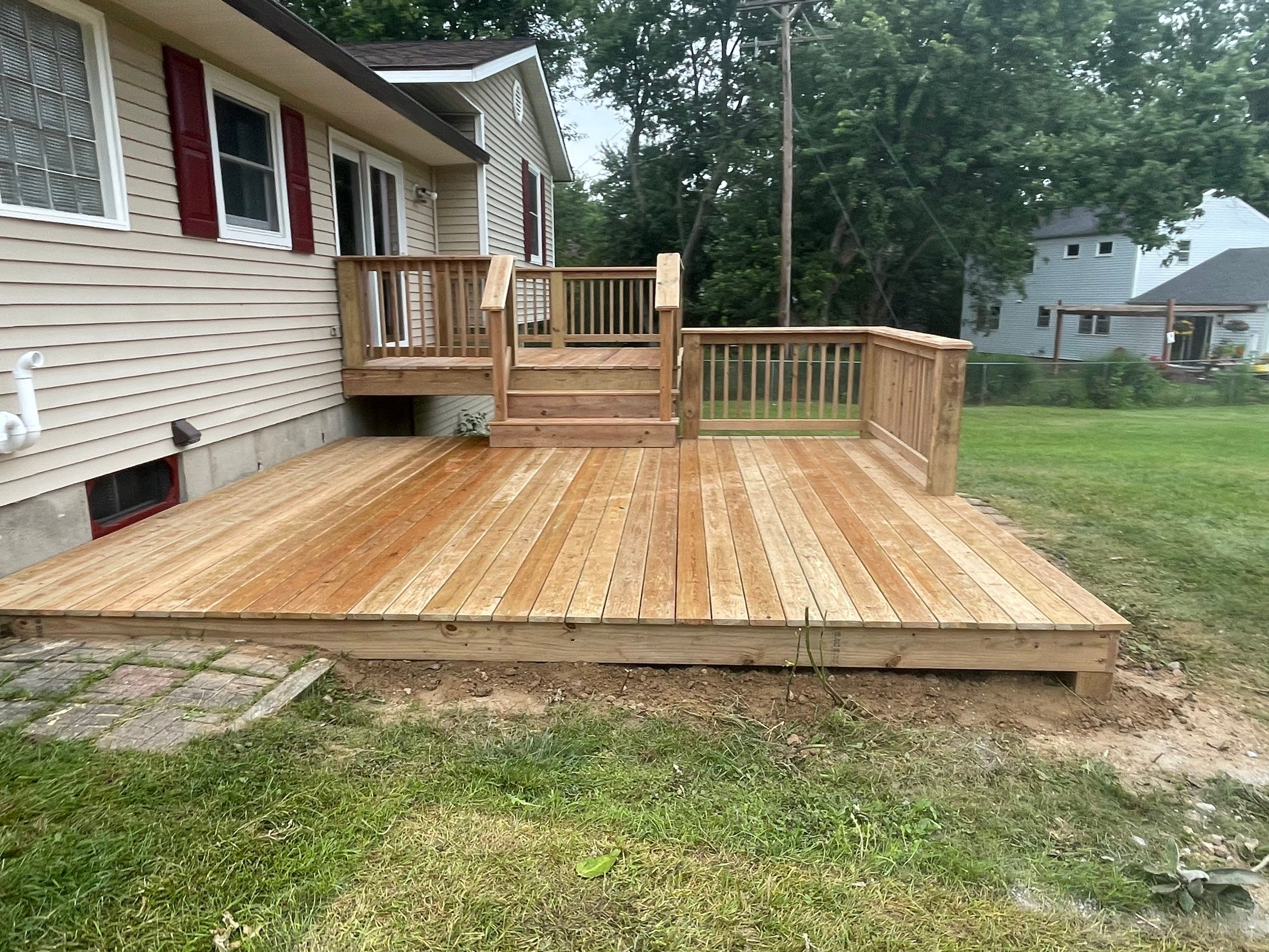 Deck Installation using Treated Lumber by Avalon Roofing and Exteriors