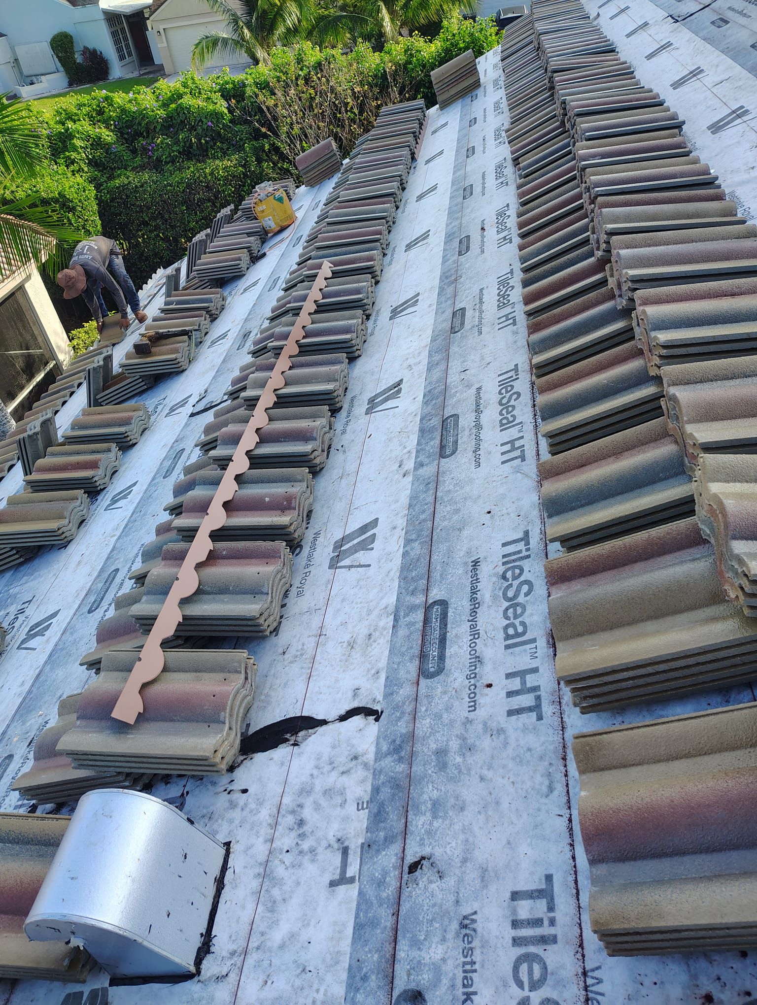 Concrete Tile Roof Replacement and Wood Decking Repair in Boca Raton by Aastro Roofing