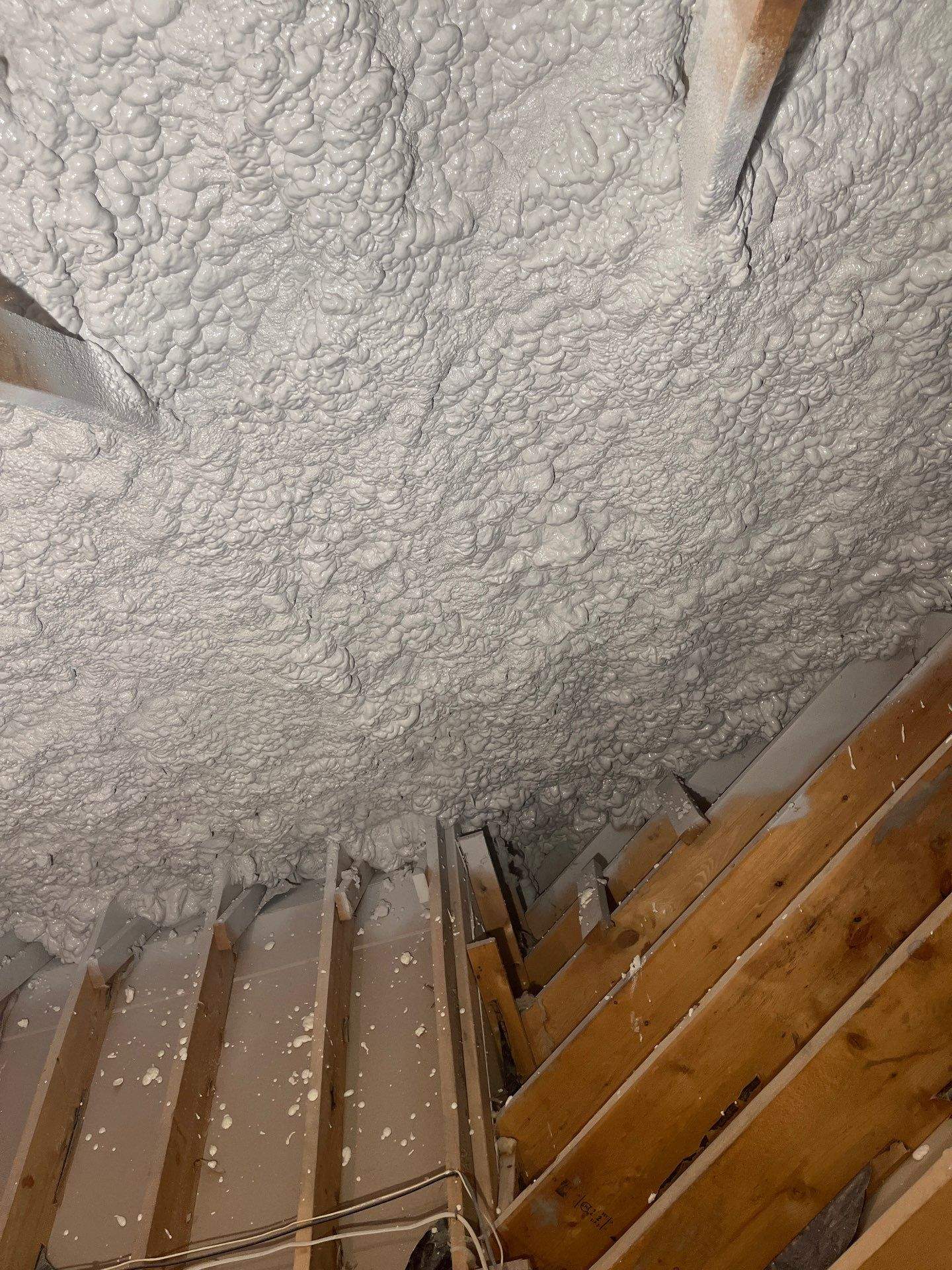 Attic Insulation using open cell spray foam by NYS Foam & Energy