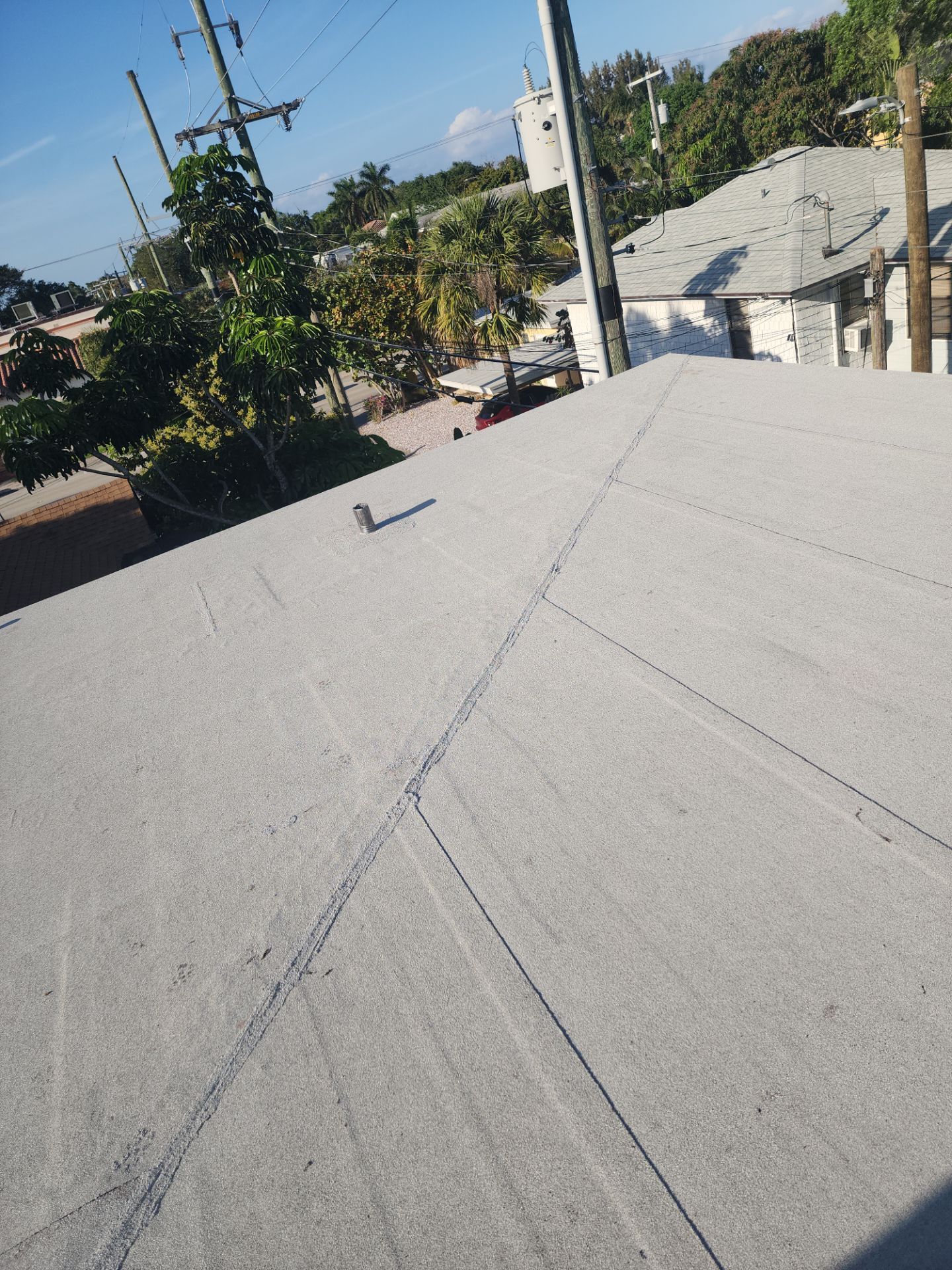 Flat Roof Replacement and Insulation Upgrade in Lake Worth Beach by Aastro Roofing