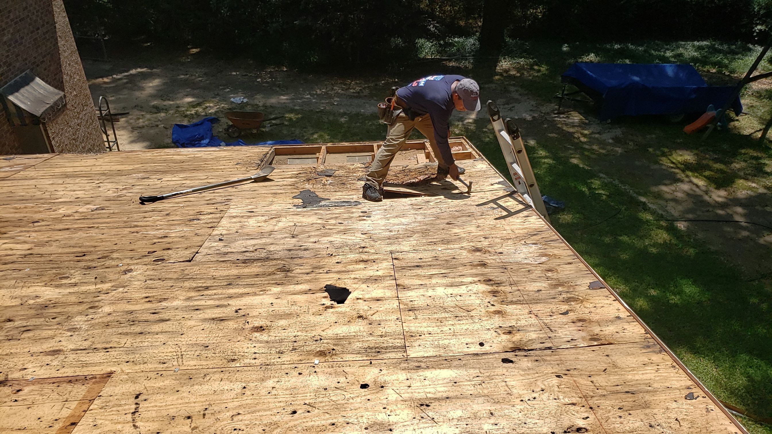 Residential Roofing Installation using Roof Replacement by American Roofing & Construction LLC