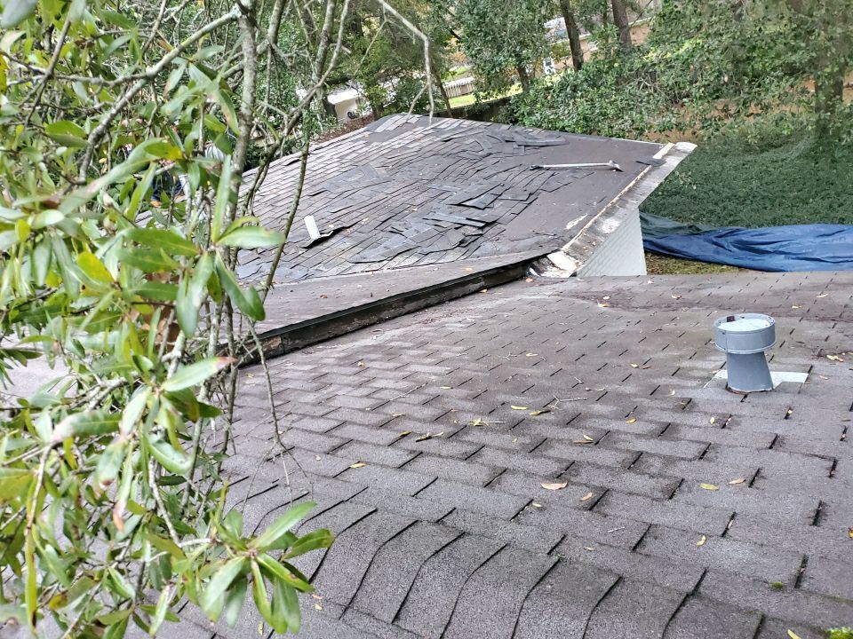 Residential Roofing Installation using Roof Replacement by American Roofing & Construction LLC