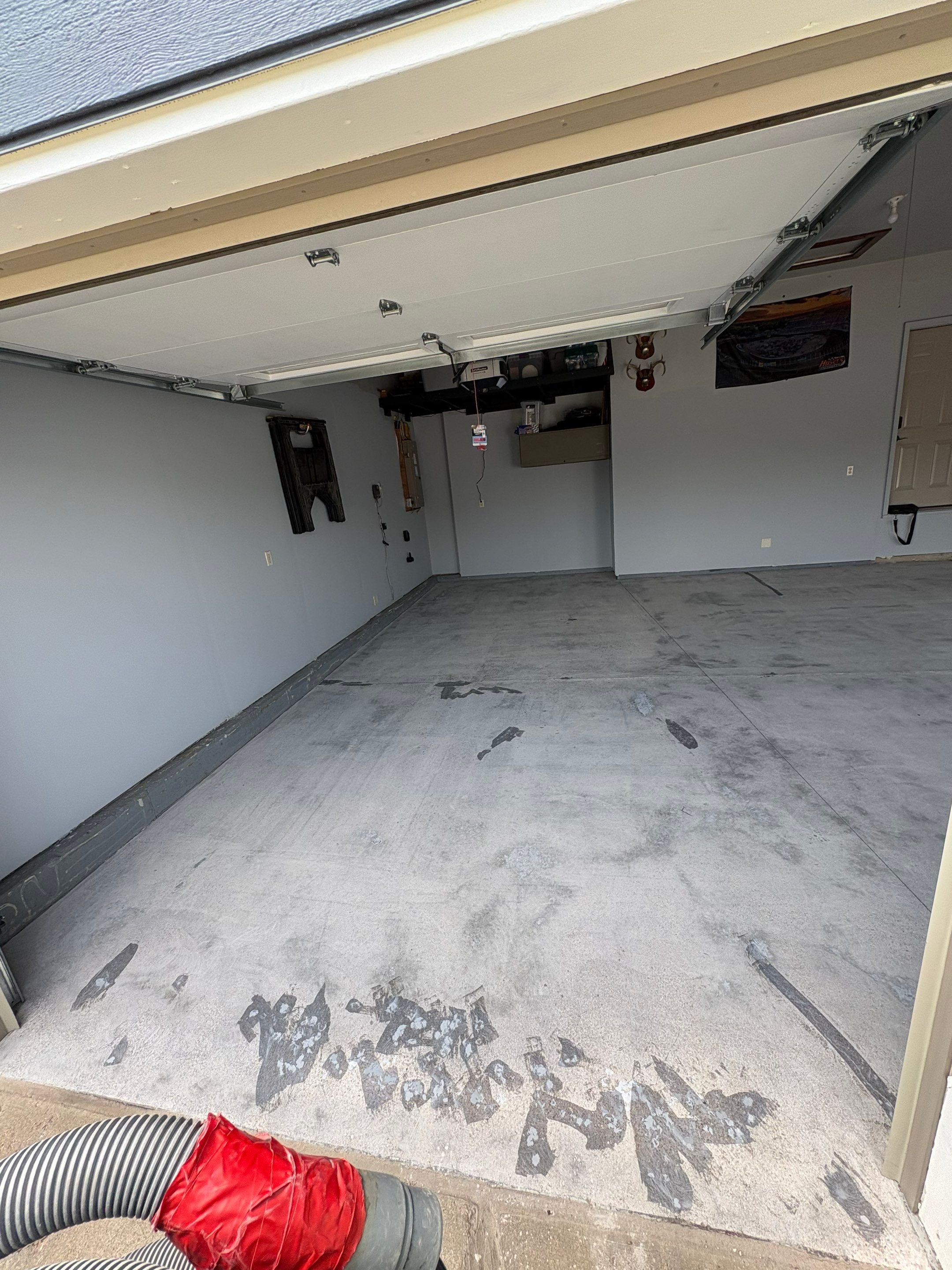 Sioux Falls Garage Concrete Coating Installation with Domino Flake by Select Painting, Coatings & Garage Cabinets