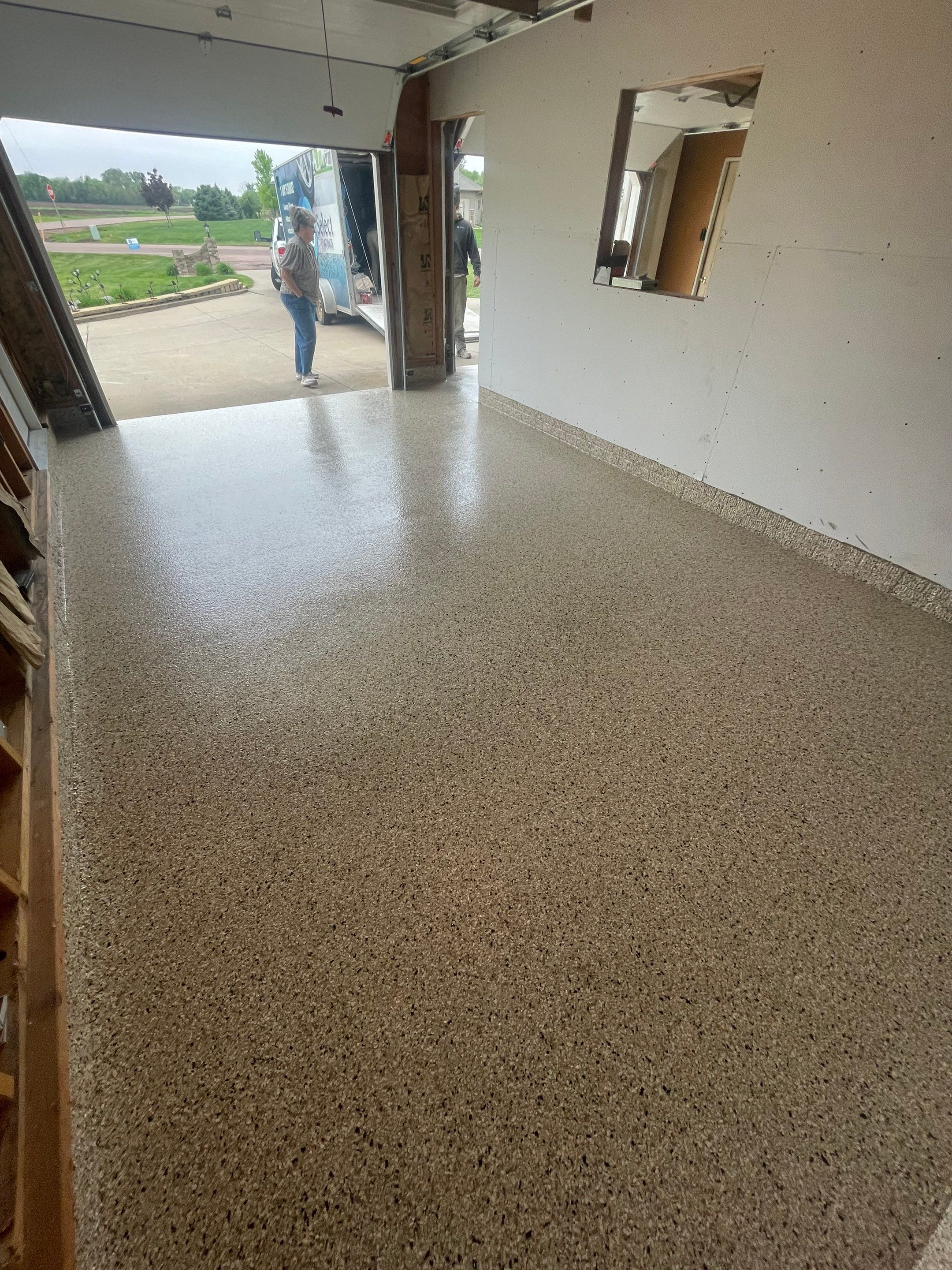 Speckled Epoxy Floor Coating Installation for Centerville Residential Garage by Select Painting, Coatings & Garage Cabinets