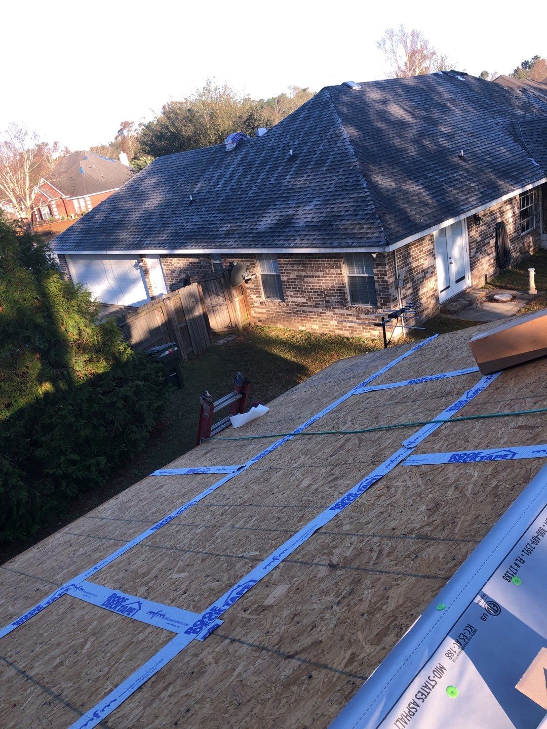 Residential Roofing Installation using Roof Replacement by American Roofing & Construction LLC