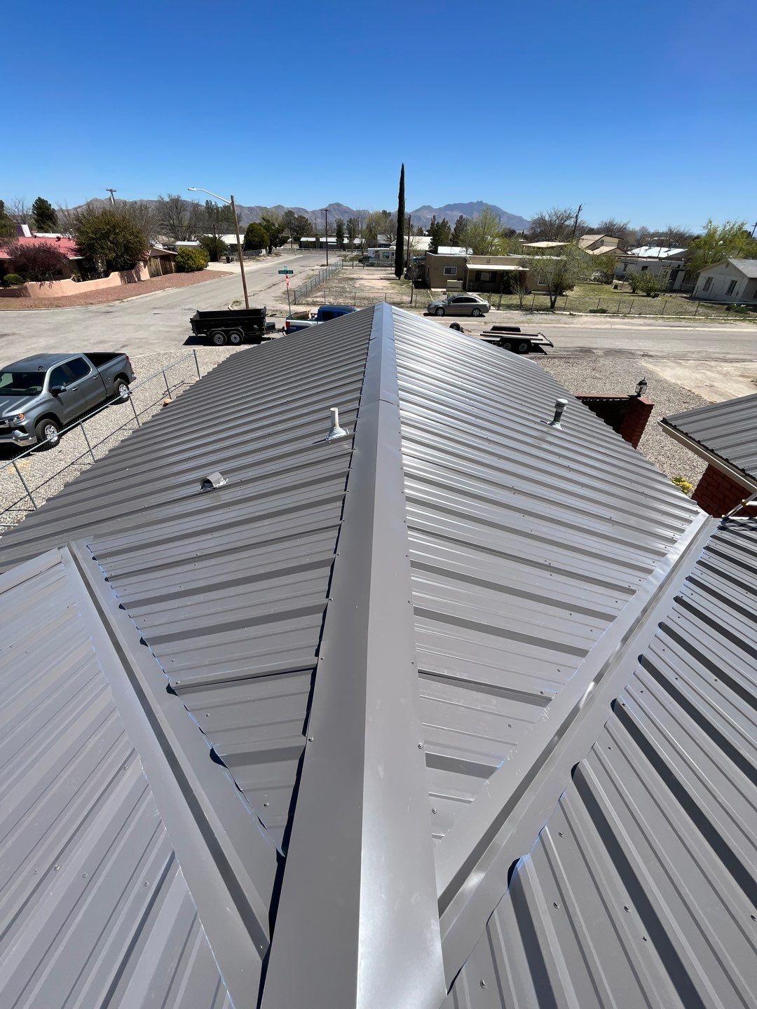 Ash Gray Exposed Fastener by Reimagine Roofing