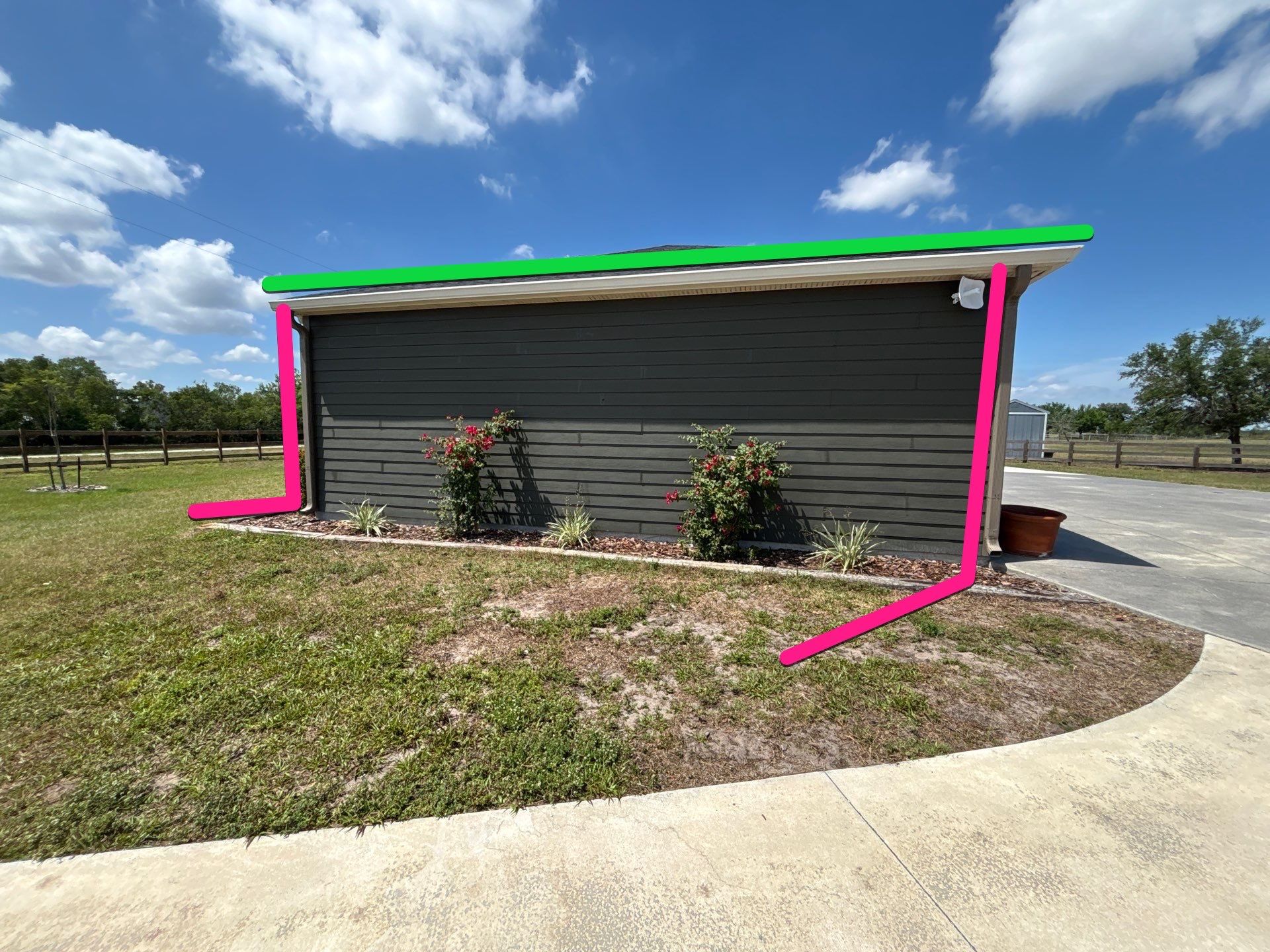  7-inch White seamless gutters and downspouts in Myakka City FL by Gutter Professors