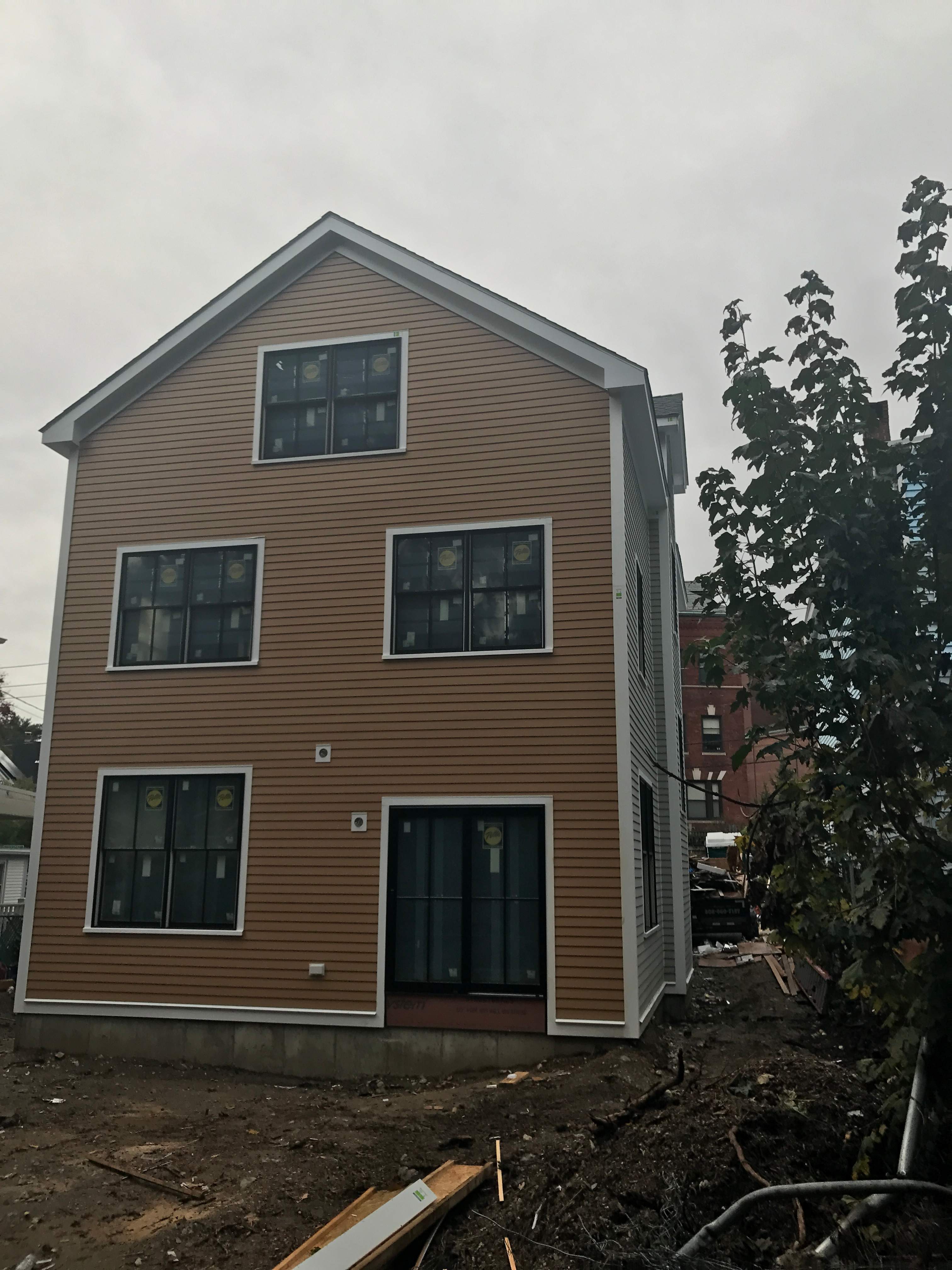 Siding Installation using Wood Clapboards by UBrothers Construction