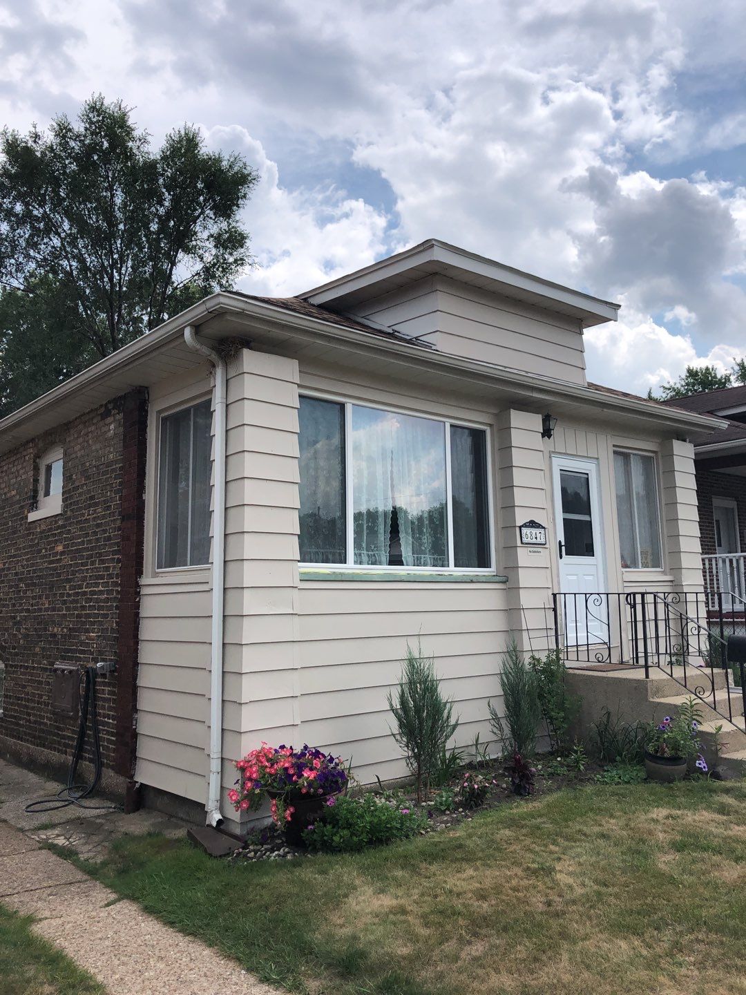 Window Installation using vinyl windows by Kraz Construction
