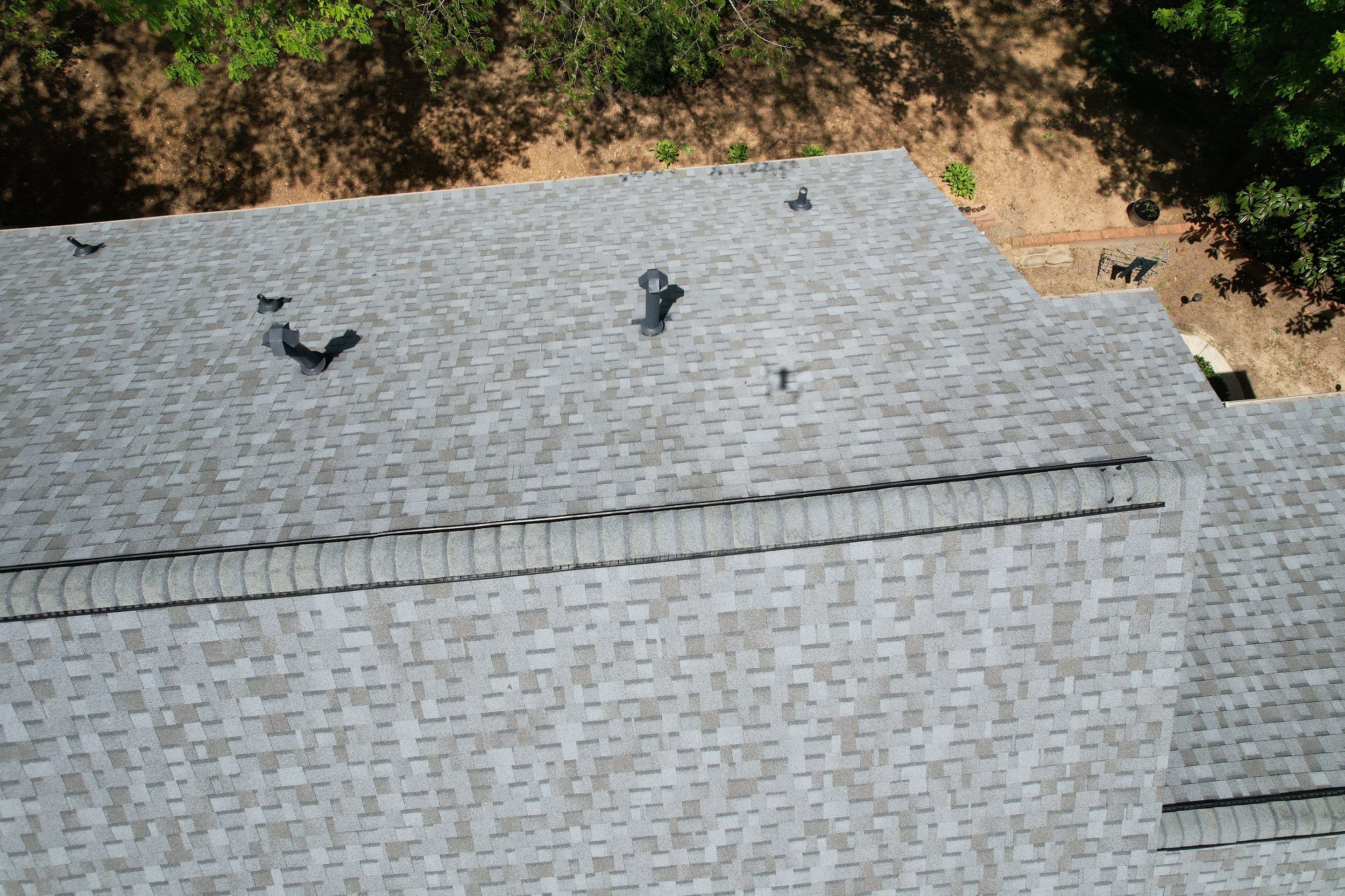 Residential Roofing Installation using Owens Corning Quary Gray by Inspector Roofing and Restoration