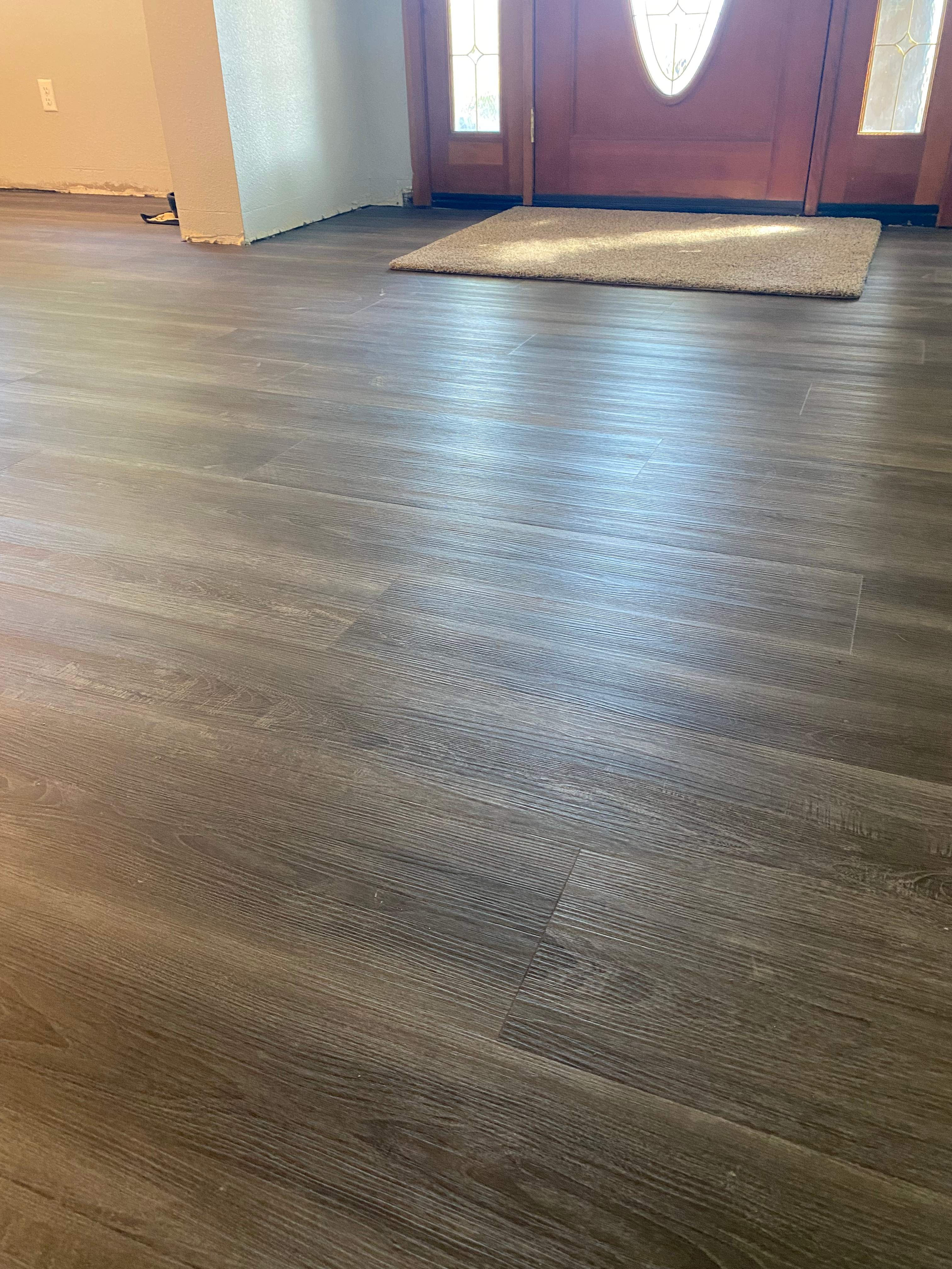 LVP Flooring for newly remodeled kitchen in Newcastle. by Footprints Floors South Sacramento
