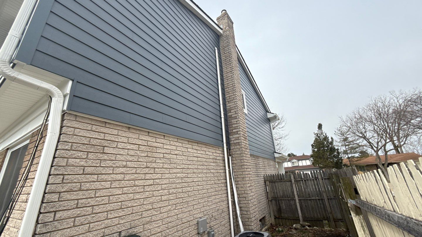 Siding Replacement using Alside Midnight Blue by 180 Contractors